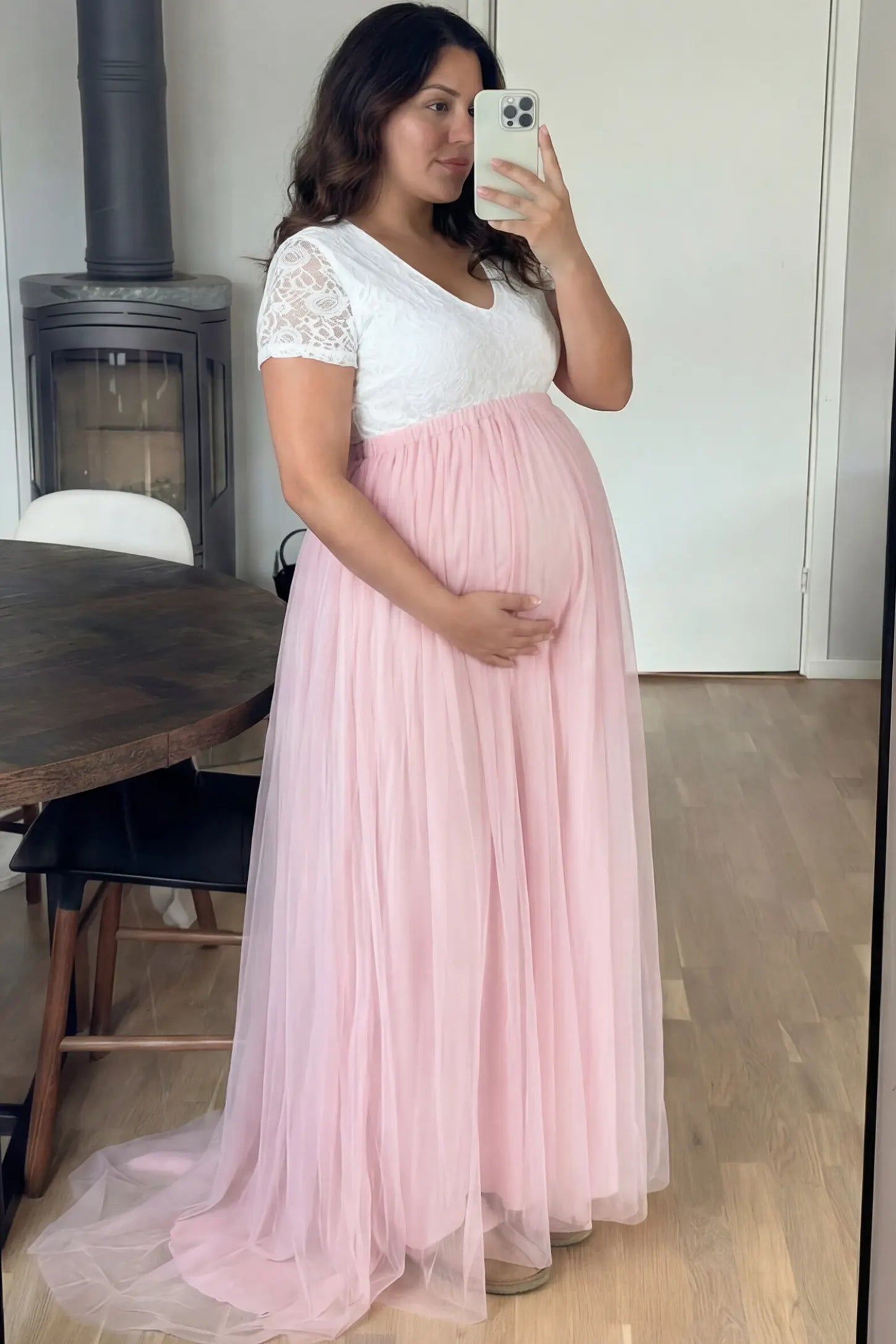 Lace & Tulle Short Sleeve Maternity Gown Lace & Tulle Short Sleeve Maternity Gown in pink featuring V-neck lace bodice, empire waist, and flowing tulle train on pregnant model.