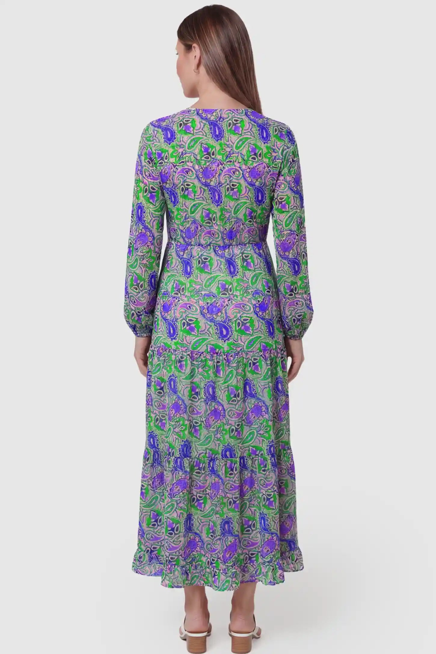 Paisley Print V-Neck Tiered Maternity Maxi Dress Paisley Print V-Neck Tiered Maternity Maxi Dress in green paisley pattern featuring empire waist and flowy tiered skirt on pregnant model.