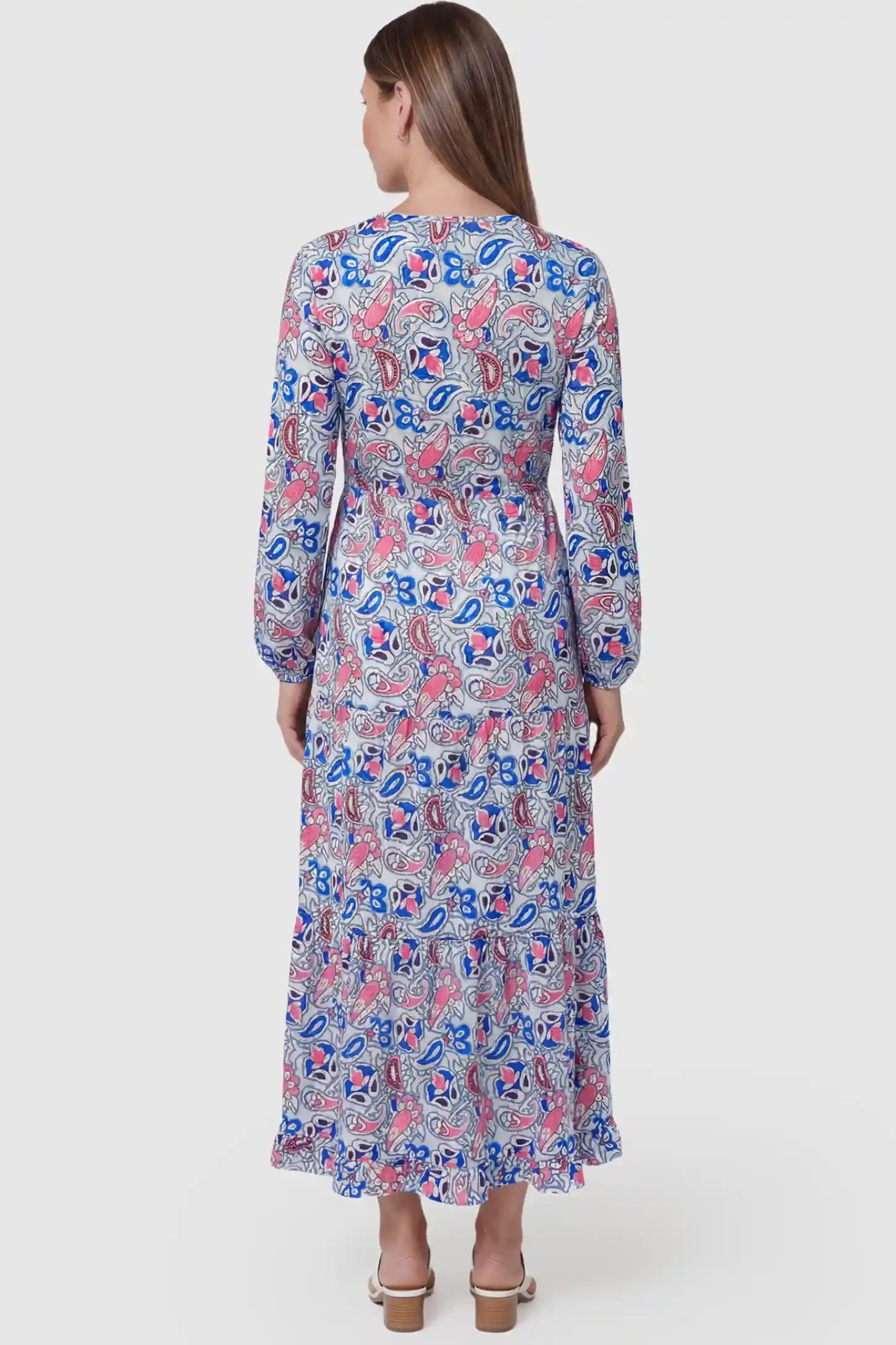 Paisley Print V-Neck Tiered Maternity Maxi Dress Paisley Print V-Neck Tiered Maternity Maxi Dress in peach red paisley pattern featuring empire waist and flowy tiered skirt on pregnant model.