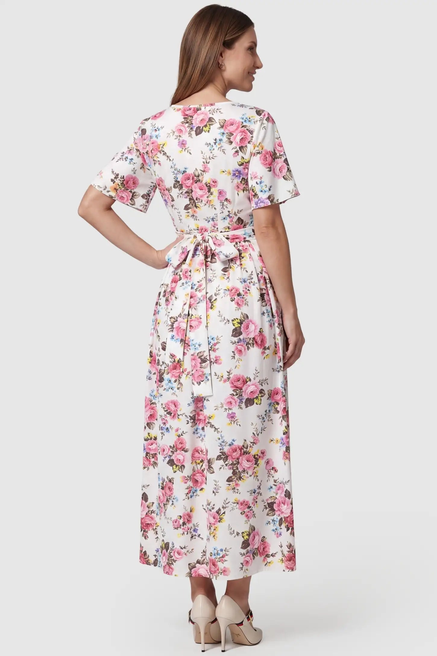 Discreet Nursing Opening Floral Tie-Waist Maternity & Nursing Maxi Dress Discreet Nursing Opening Floral Tie-Waist Maternity & Nursing Maxi Dress in Pink Floral featuring flutter sleeves on a pregnant model.