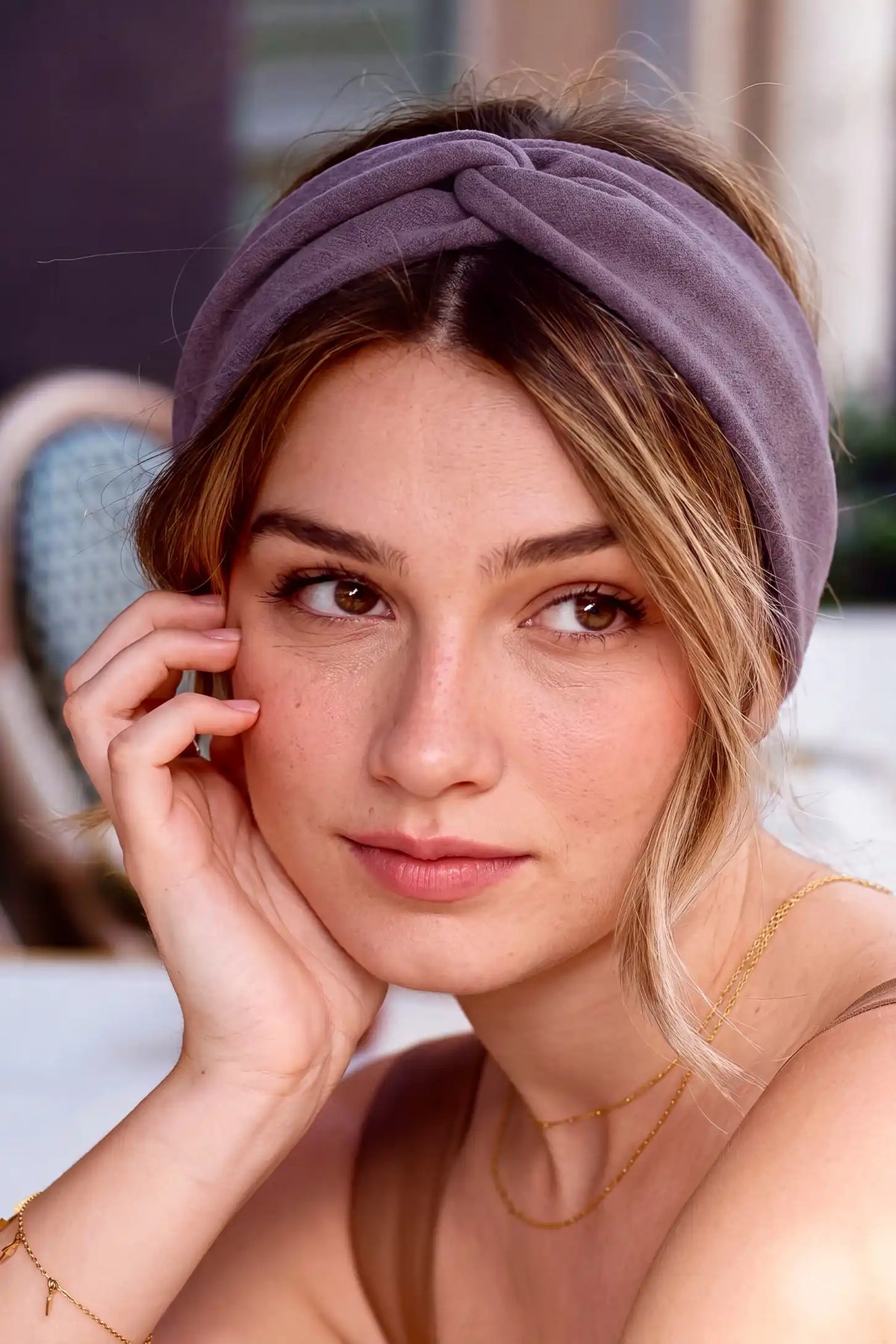 Wide Crossed Headband Wide Crossed Headband in Dusty Purple featuring comfortable elastic stretch and Korean-inspired wide front twist on a model, indoor lifestyle portrait view.