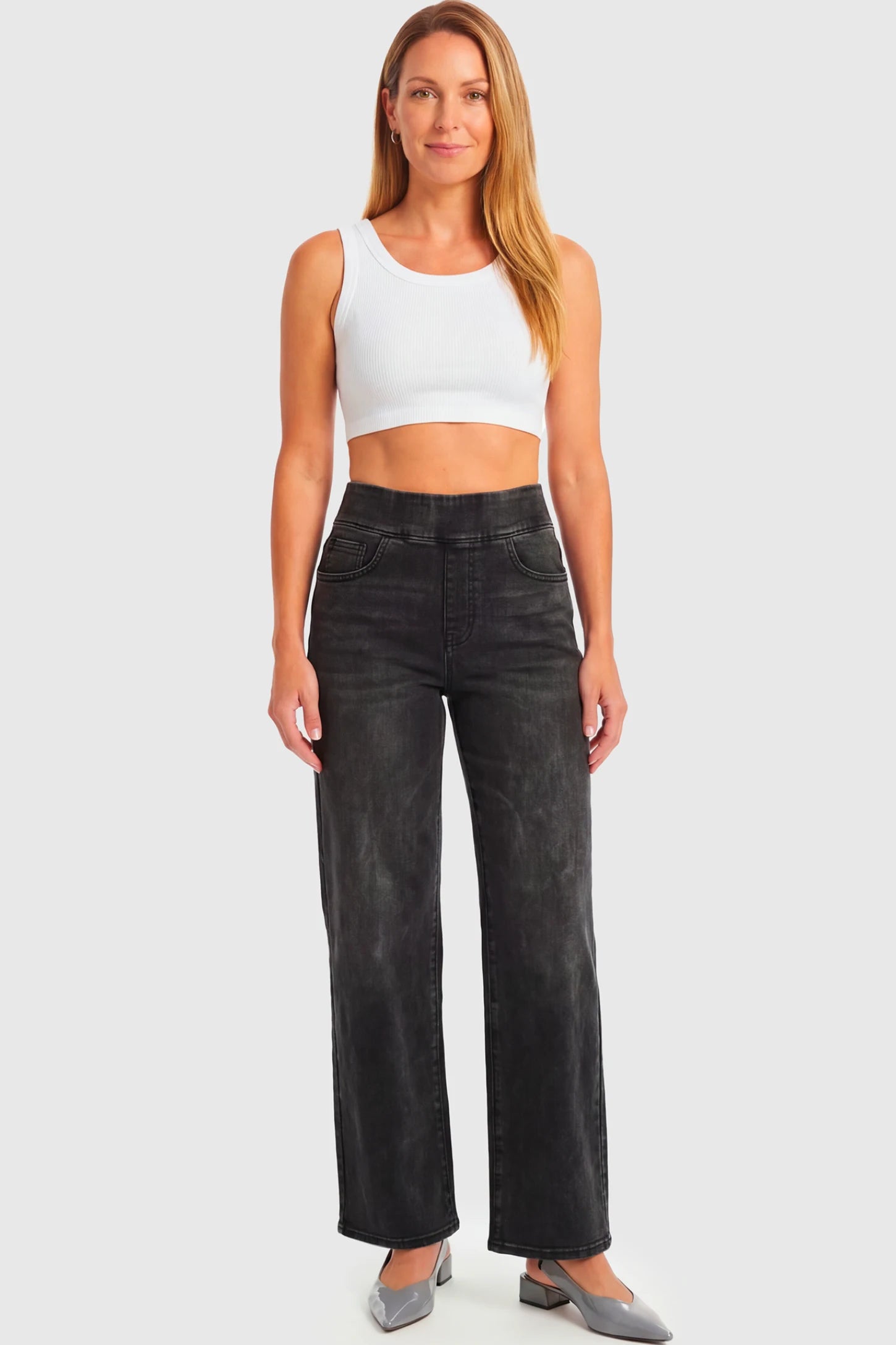 High-Rise Wide Leg Maternity Jeans High-Rise Wide Leg Maternity Jeans in black featuring over-the-belly support and wide-leg silhouette on a non pregnant model.