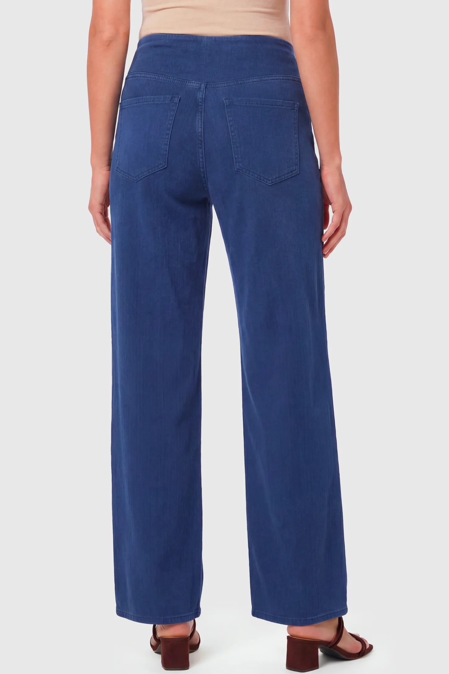 High-Rise Wide Leg Maternity Jeans High-Rise Wide Leg Maternity Jeans in dark blue featuring wide-leg silhouette on a pregnant model.