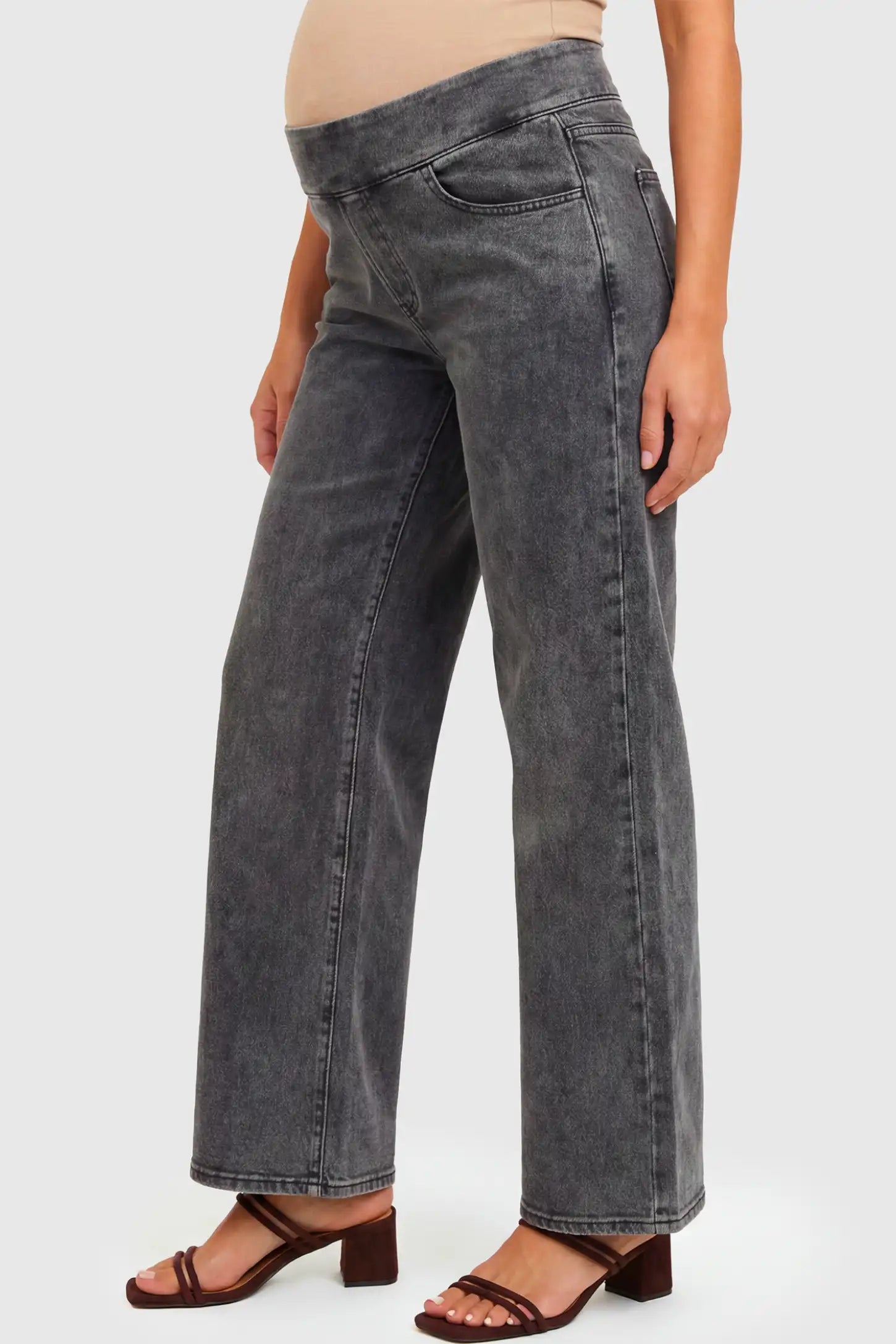 High-Rise Wide Leg Maternity Jeans High-Rise Wide Leg Maternity Jeans in gray featuring over-the-belly support and wide-leg silhouette on a pregnant model.
