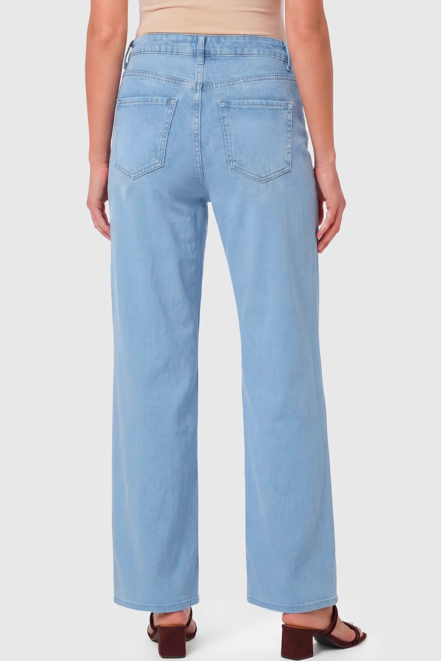 High-Rise Wide Leg Maternity Jeans High-Rise Wide Leg Maternity Jeans in light blue  featuring wide-leg silhouette on a pregnant model.