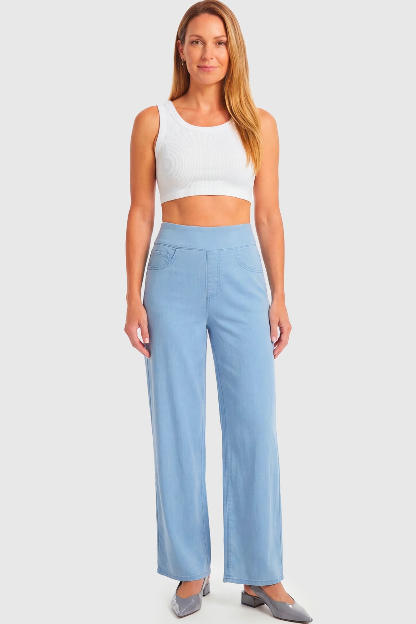 High-Rise Wide Leg Maternity Jeans High-Rise Wide Leg Maternity Jeans in light blue  featuring over-the-belly support and wide-leg silhouette on a non pregnant model.
