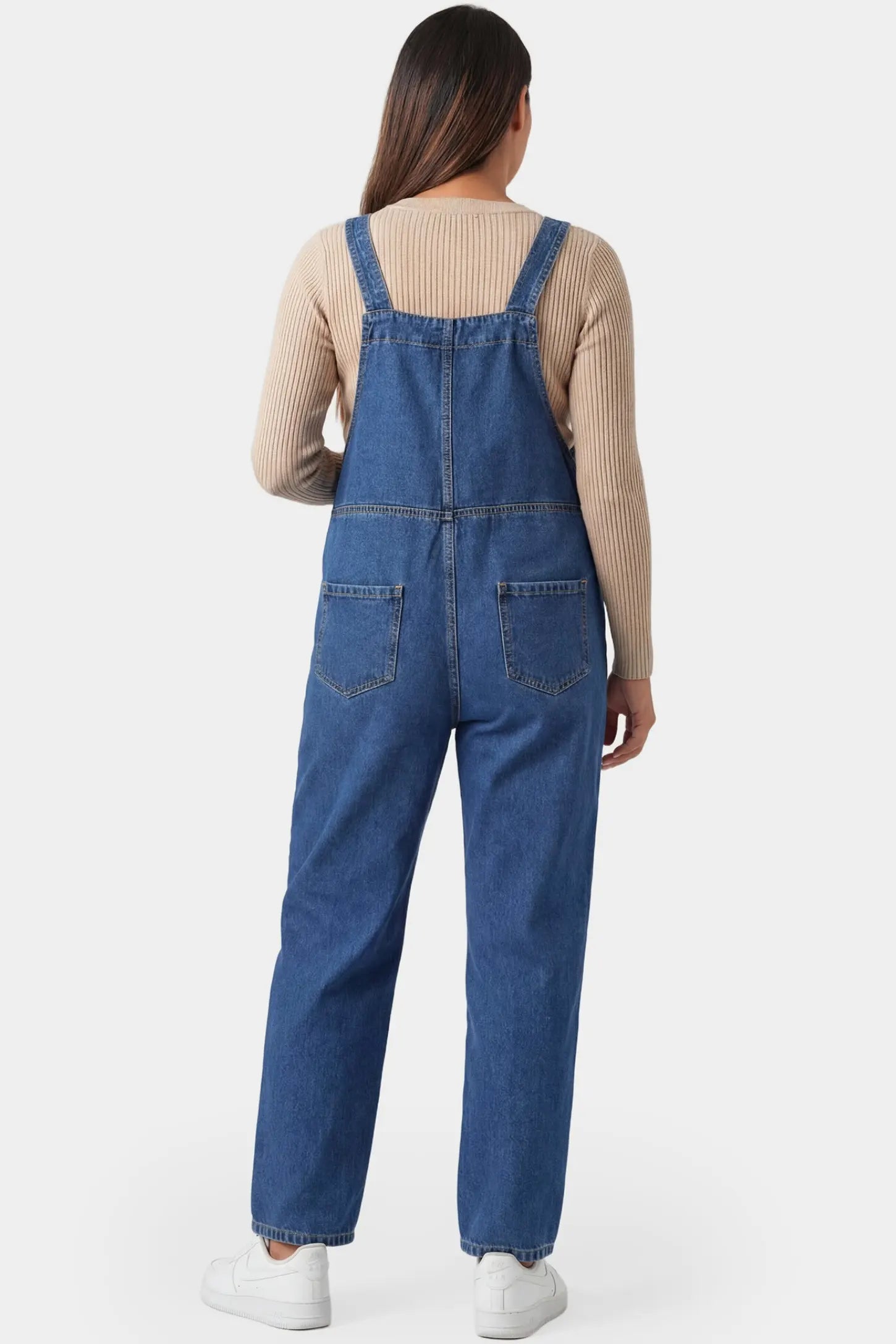 Wide Leg Relaxed Fit Maternity Overalls Wide leg relaxed fit maternity overalls in blue denim featuring adjustable straps on a pregnant model