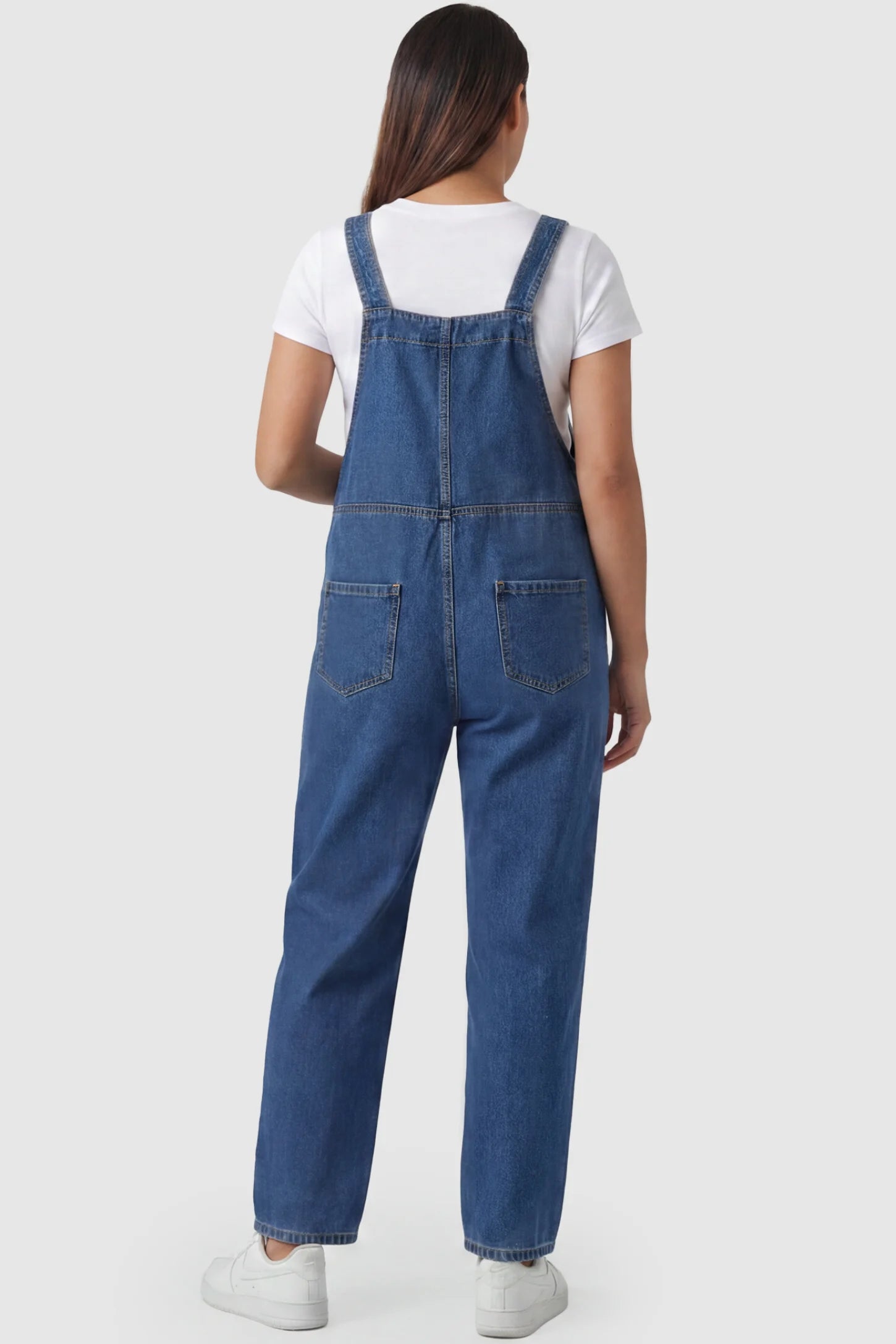 Wide Leg Relaxed Fit Maternity Overalls Wide leg relaxed fit maternity overalls in blue with back pockets, back view on pregnant model