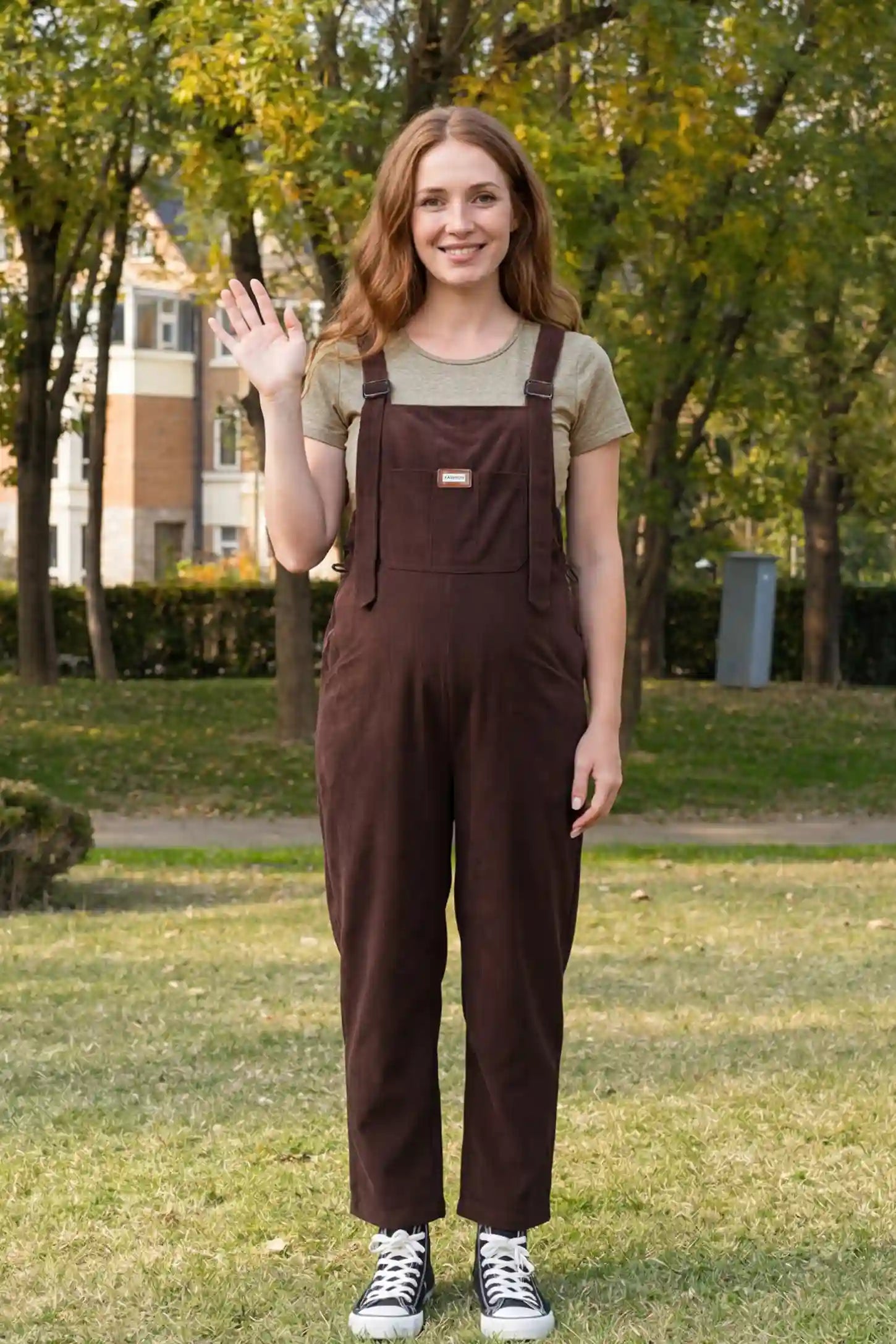 Wide Leg Side Stretch Panel Maternity Overalls Wide leg side stretch panel maternity overalls in brown with soft corduroy texture, front view on pregnant model