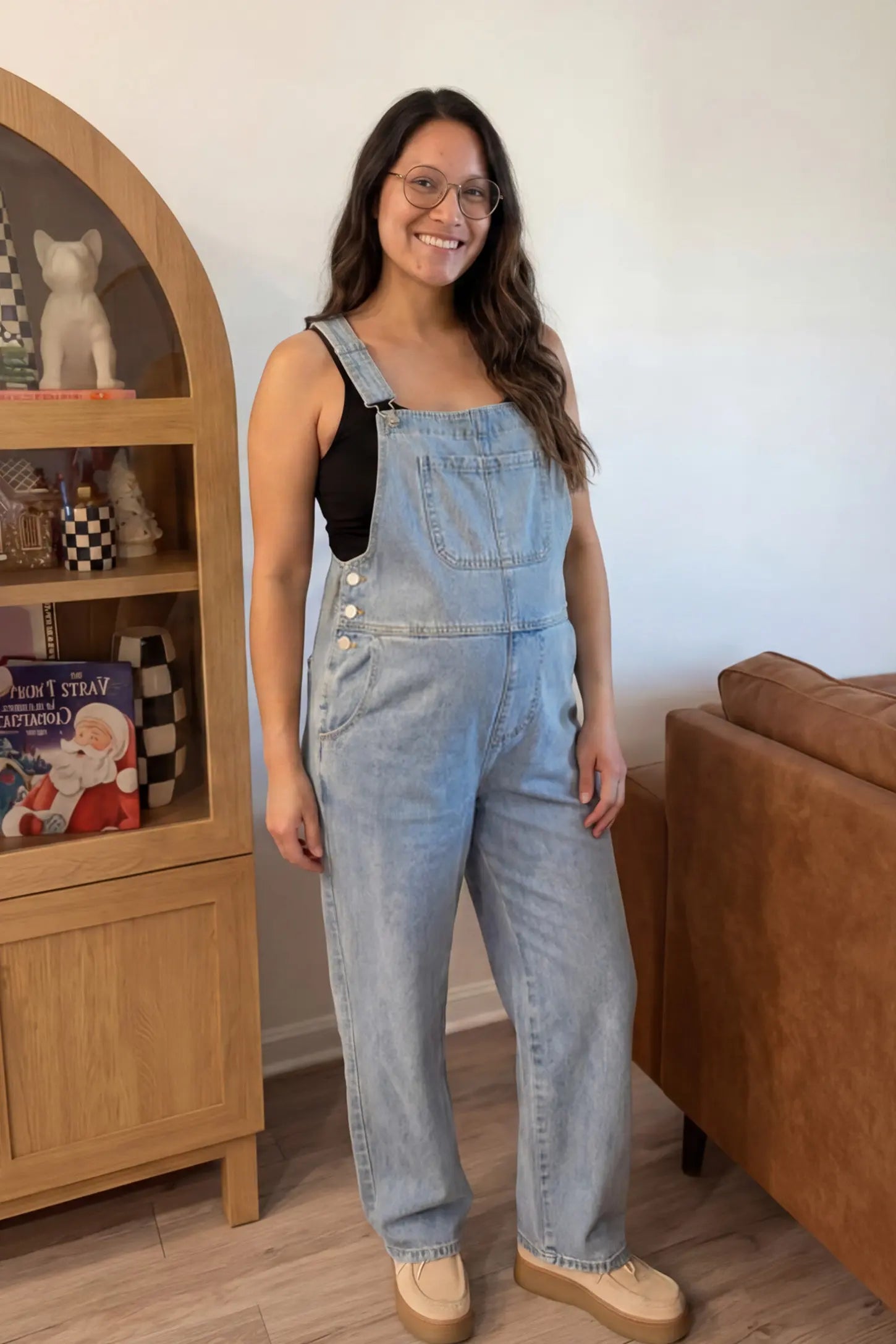 Wide Leg Relaxed Fit Maternity Overalls Wide leg relaxed fit maternity overalls in light blue with adjustable straps and front pockets, front view on pregnant model