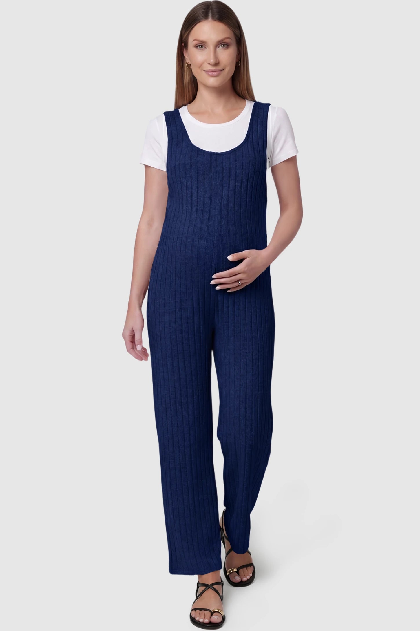 Ribbed Sleeveless Wide-Leg Maternity Jumpsuit Ribbed sleeveless wide-leg maternity jumpsuit in royal blue with sleeveless ribbed design, front view on pregnant model