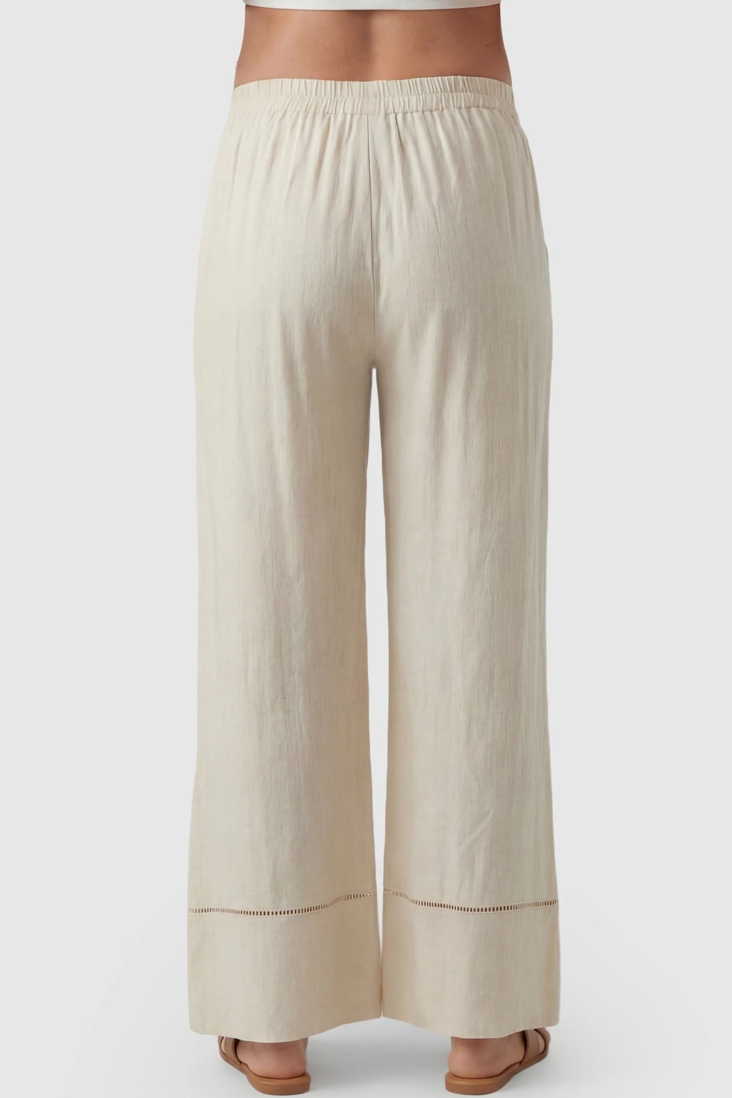 High-Waist Drawstring Wide-Leg Maternity Pants High-waist drawstring wide-leg maternity pants in beige with wide-leg silhouette, back view on pregnant model