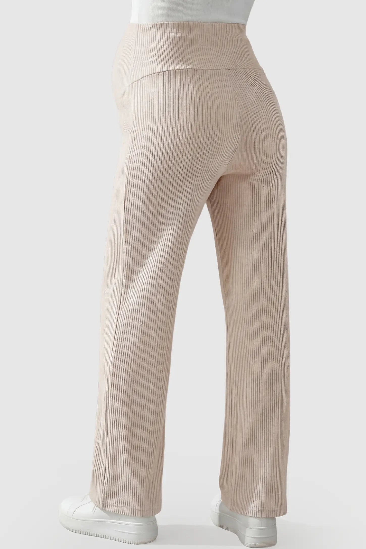 Adjustable Waistband High Waisted Wide-Leg Maternity Pants Adjustable waistband high waisted wide-leg maternity pants in beige featuring comfortable high-rise fit in back view on a pregnant model