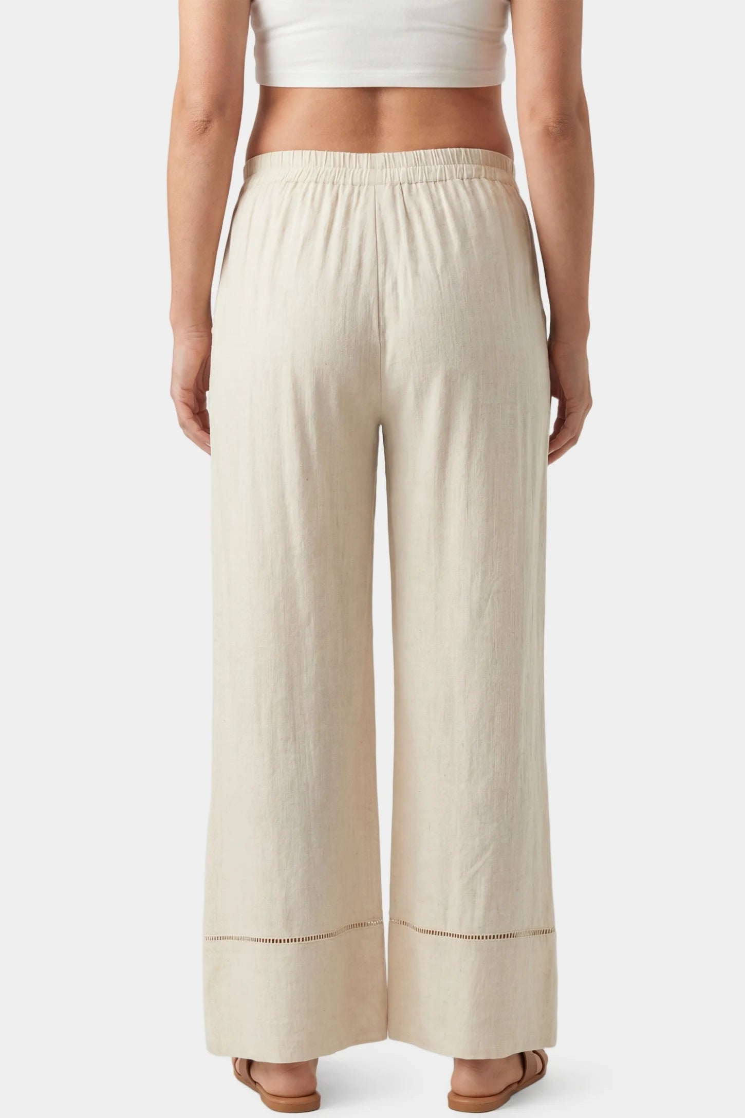 High-Waist Drawstring Wide-Leg Maternity Pants High-waist drawstring wide-leg maternity pants in beige with wide-leg silhouette, back view on pregnant model