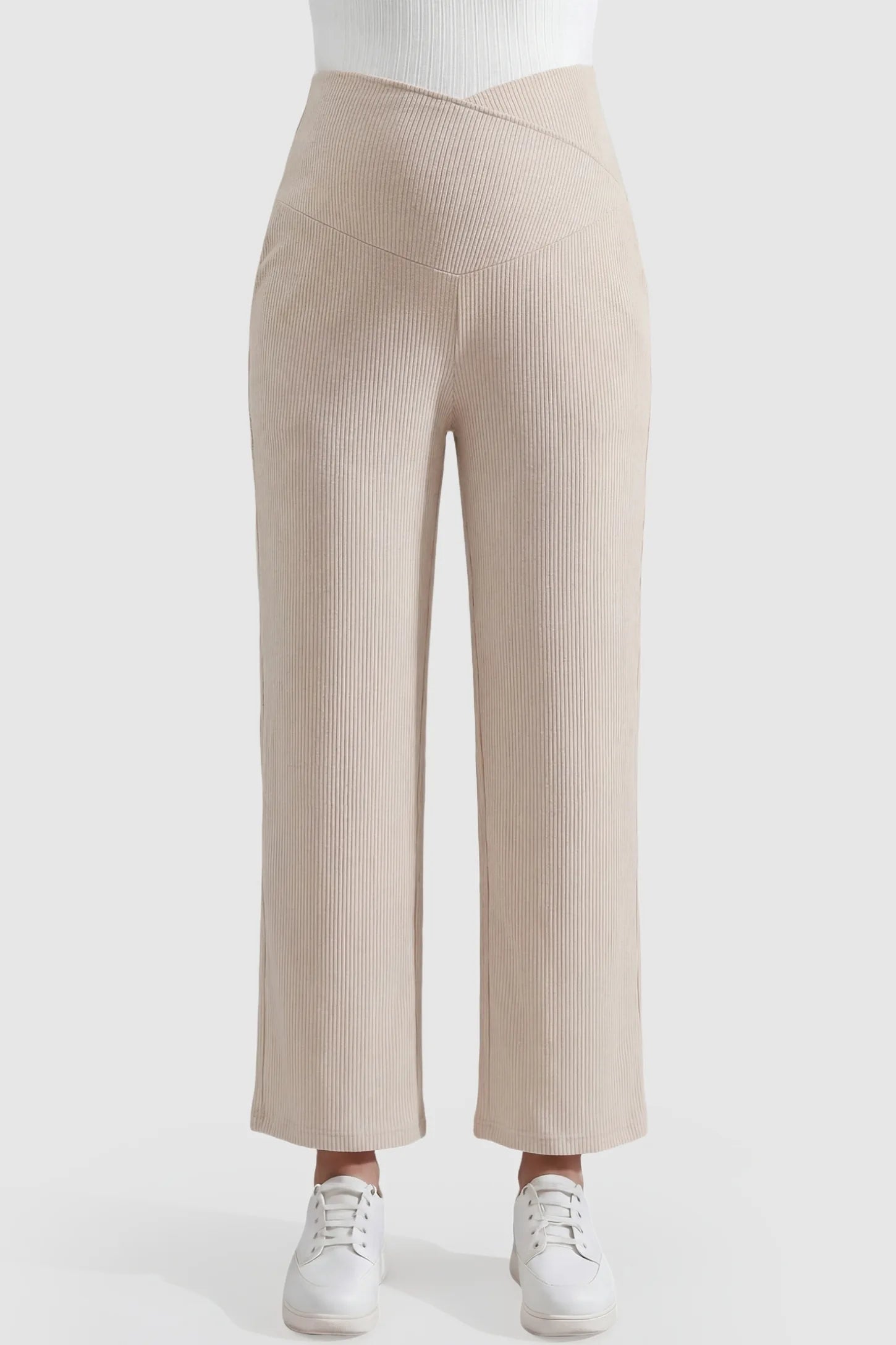 Adjustable Waistband High Waisted Wide-Leg Maternity Pants Adjustable waistband high waisted wide-leg maternity pants in beige featuring a wide-leg silhouette in front view on a pregnant model