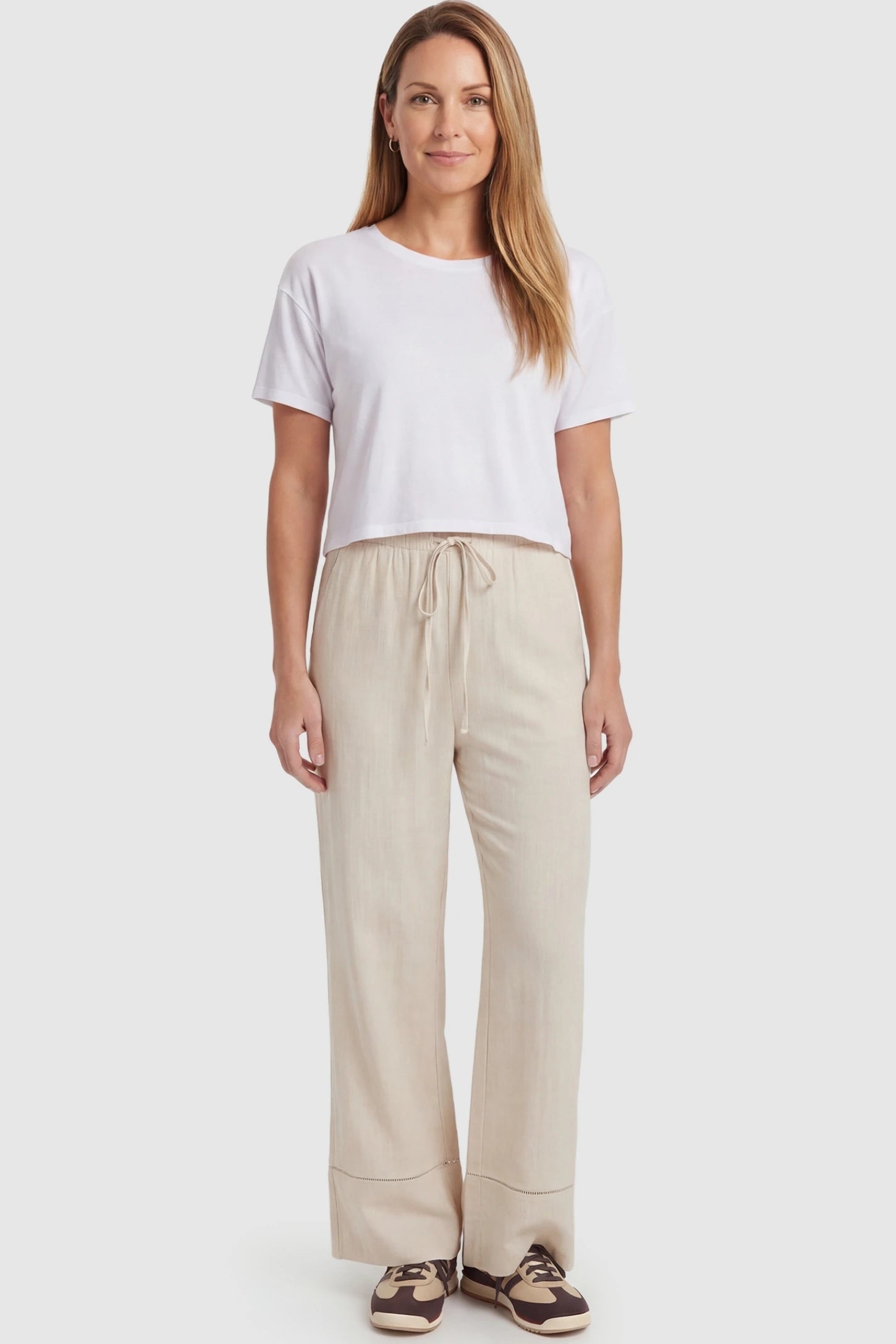 High-Waist Drawstring Wide-Leg Maternity Pants High-waist drawstring wide-leg maternity pants in beige with breathable stretch blend, full body on postpartum model