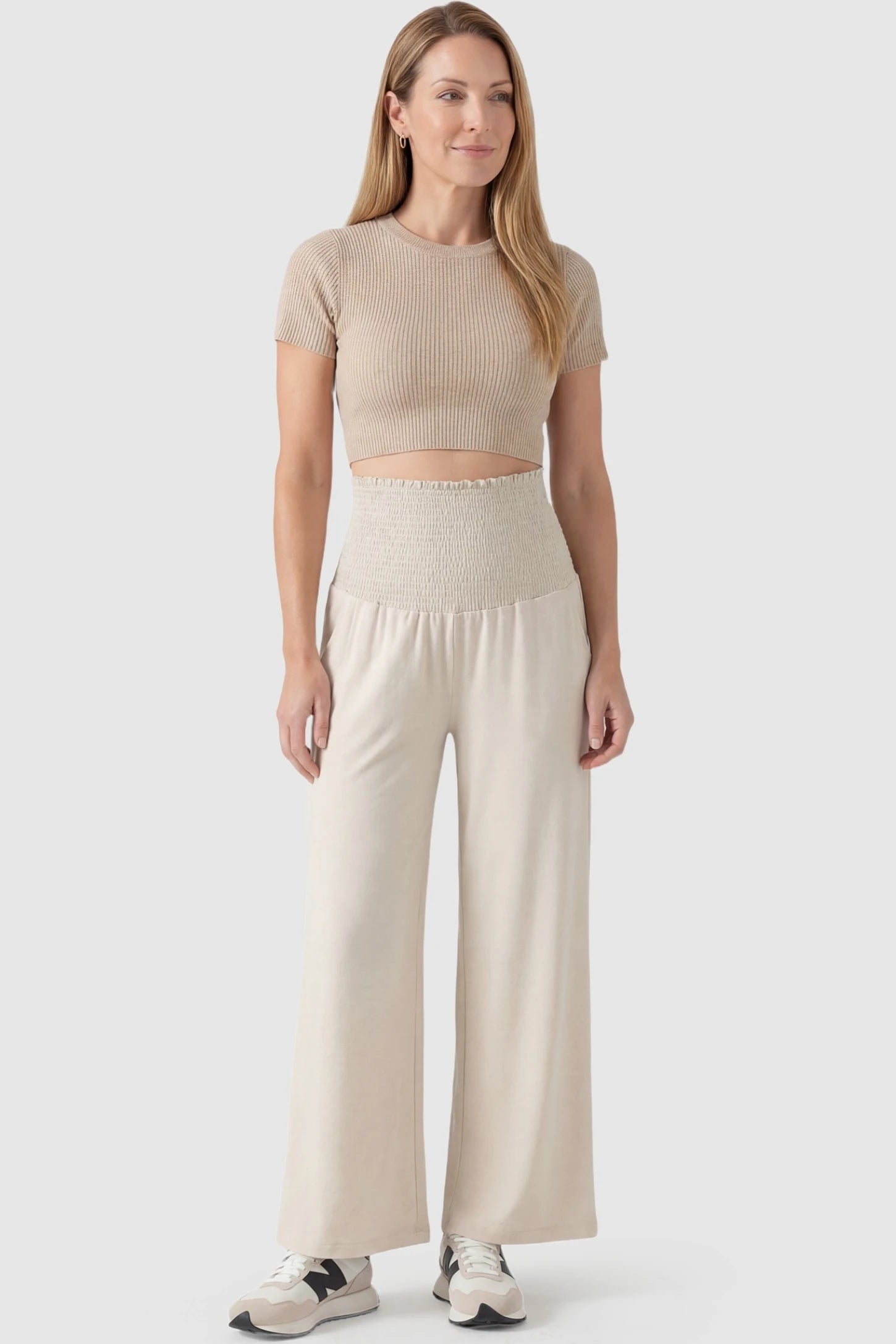 Stretch Waistband High-Waist Wide-Leg Maternity Pants High-waist wide-leg maternity pants in beige with flexible fit, full body on postpartum model