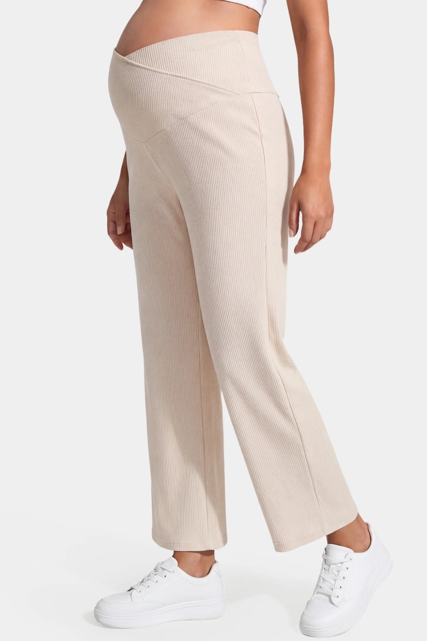 Adjustable Waistband High Waisted Wide-Leg Maternity Pants Adjustable waistband high waisted wide-leg maternity pants in beige featuring stretchy polyester-spandex fabric in side view on a pregnant model