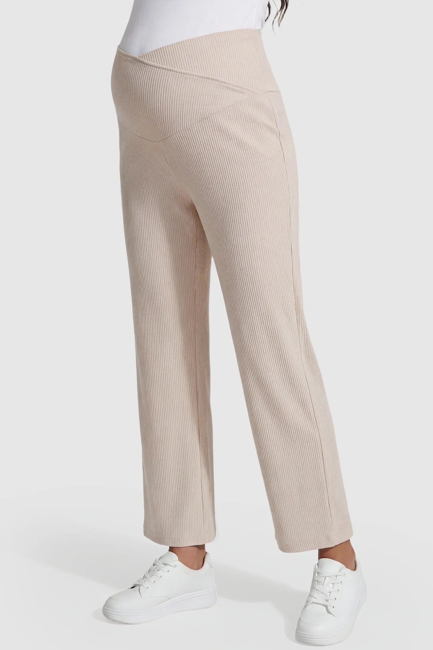 Adjustable Waistband High Waisted Wide-Leg Maternity Pants Adjustable waistband high waisted wide-leg maternity pants in beige featuring stretchy polyester-spandex fabric in side view on a pregnant model