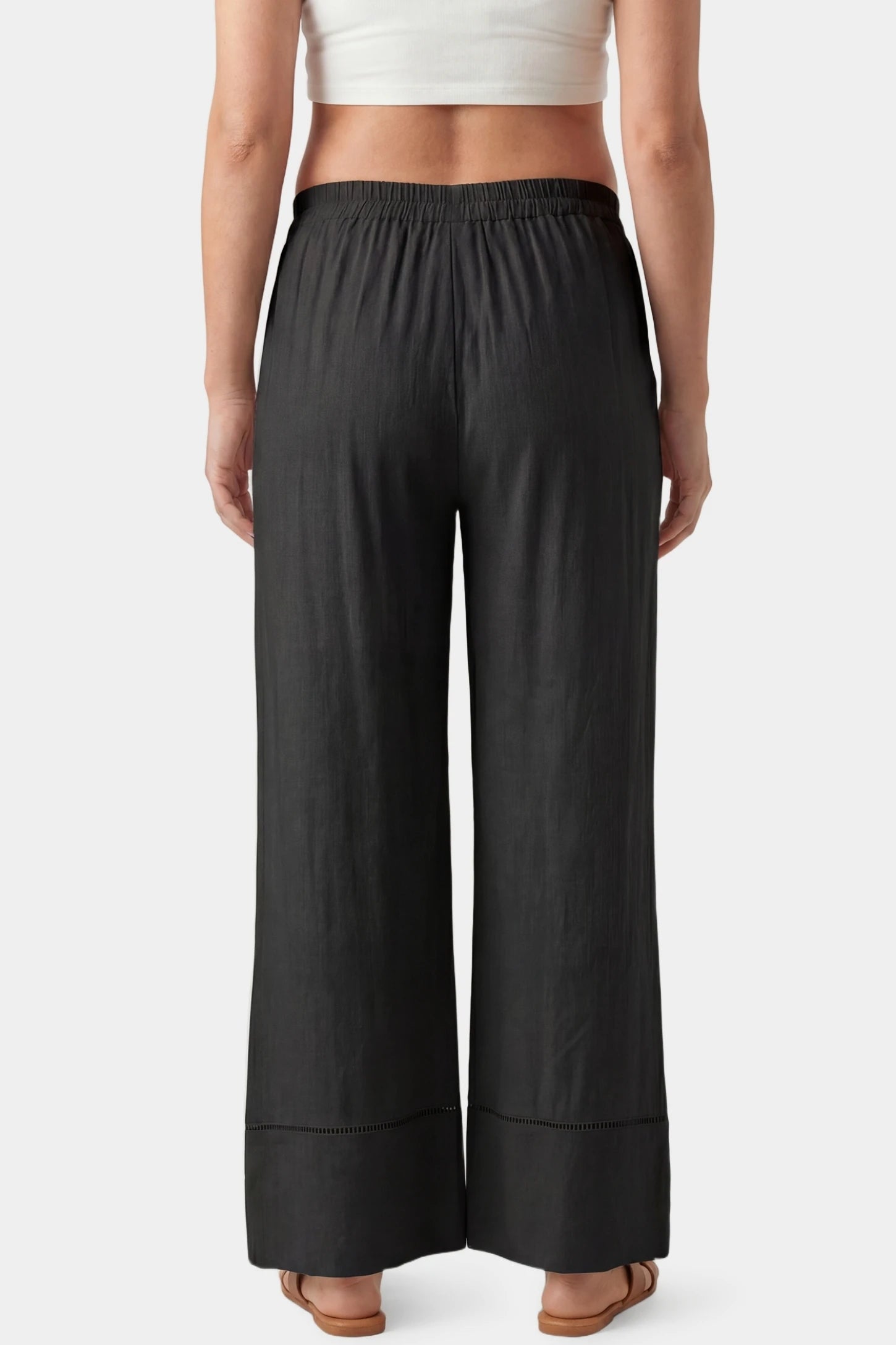 High-Waist Drawstring Wide-Leg Maternity Pants High-waist drawstring wide-leg maternity pants in black with wide-leg silhouette, back view on pregnant model