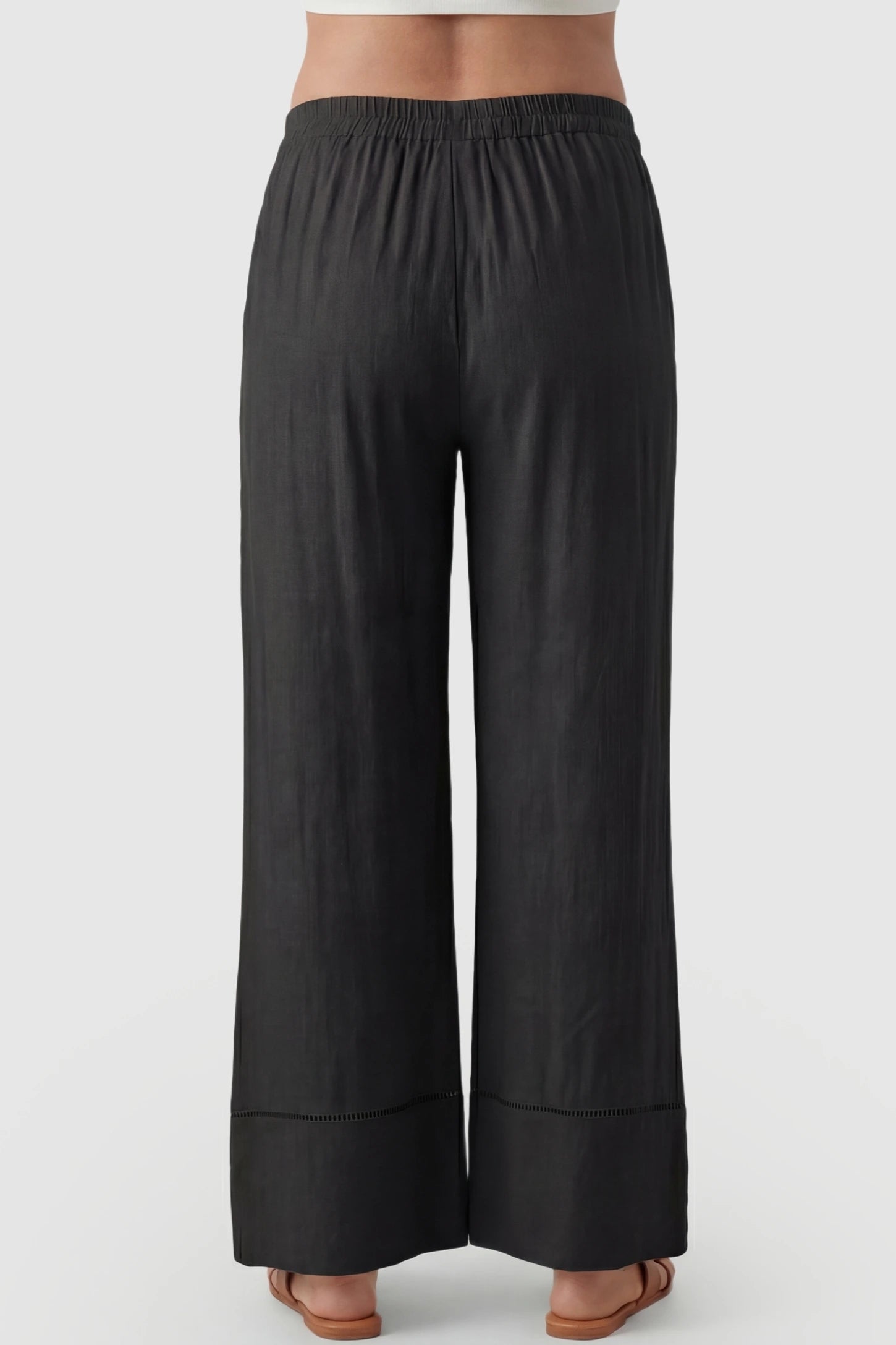 High-Waist Drawstring Wide-Leg Maternity Pants High-waist drawstring wide-leg maternity pants in black with wide-leg silhouette, back view on pregnant model