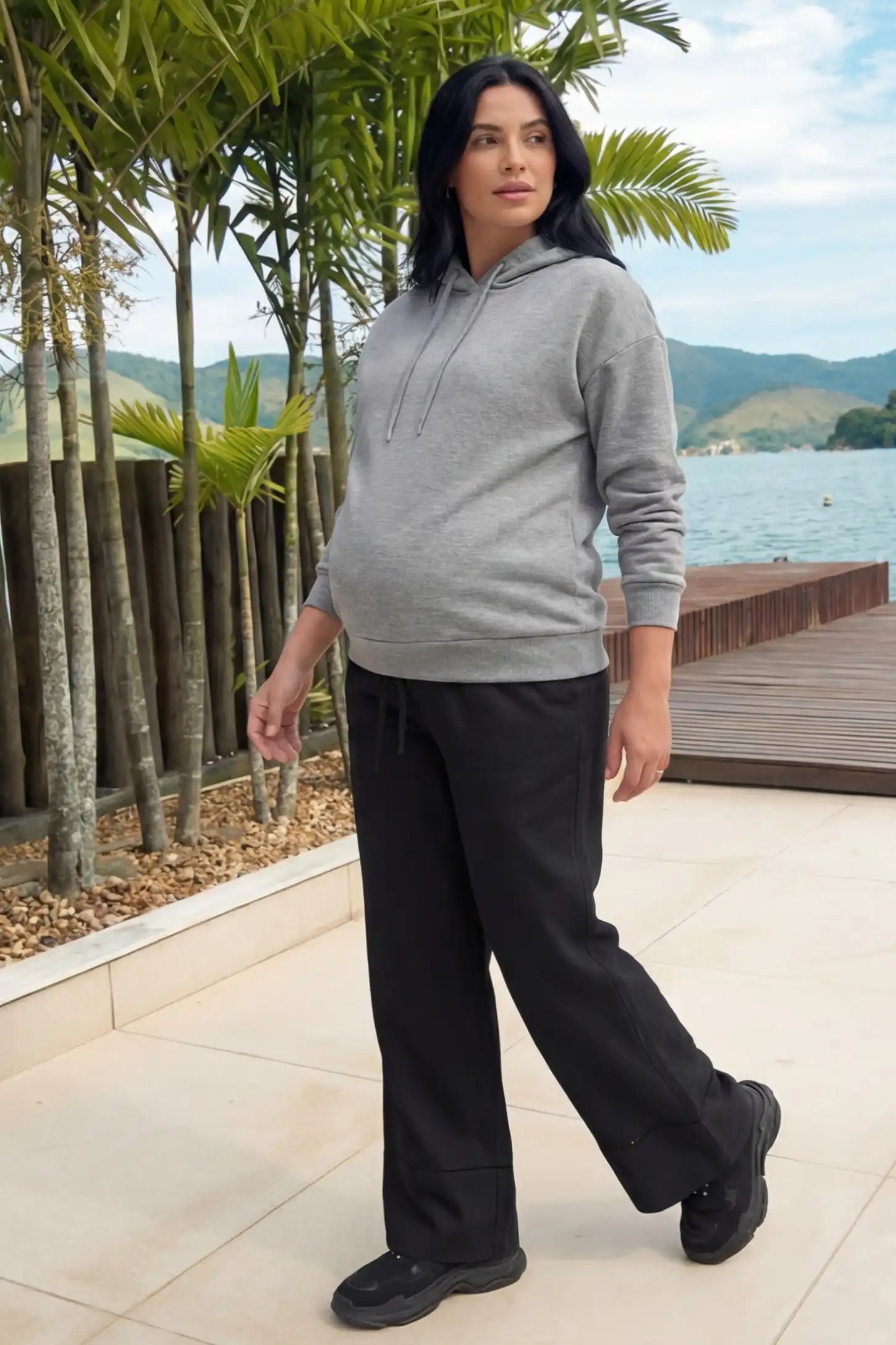 High-Waist Drawstring Wide-Leg Maternity Pants High-waist drawstring wide-leg maternity pants in black with loose silhouette, full body on editorial lifestyle model