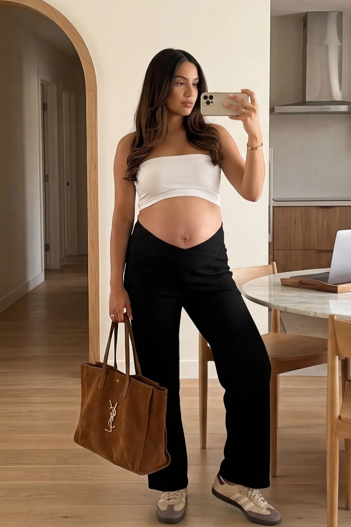 Adjustable Waistband High Waisted Wide-Leg Maternity Pants Adjustable waistband high waisted wide-leg maternity pants in black featuring relaxed flowing silhouette in full body view on a editorial lifestyle model