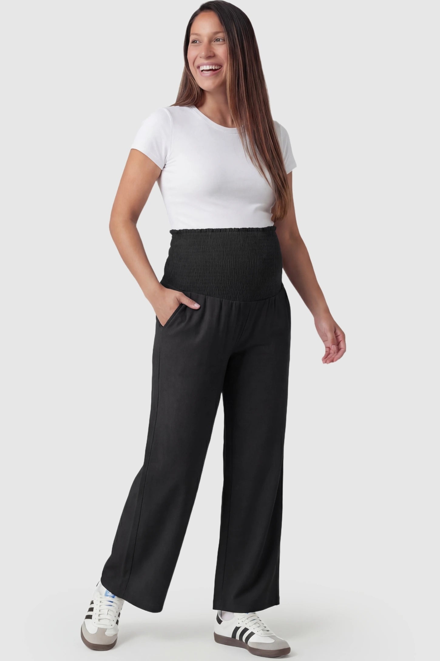 Stretch Waistband High-Waist Wide-Leg Maternity Pants High-waist wide-leg maternity pants in black gray with relaxed drape, full body on pregnant model