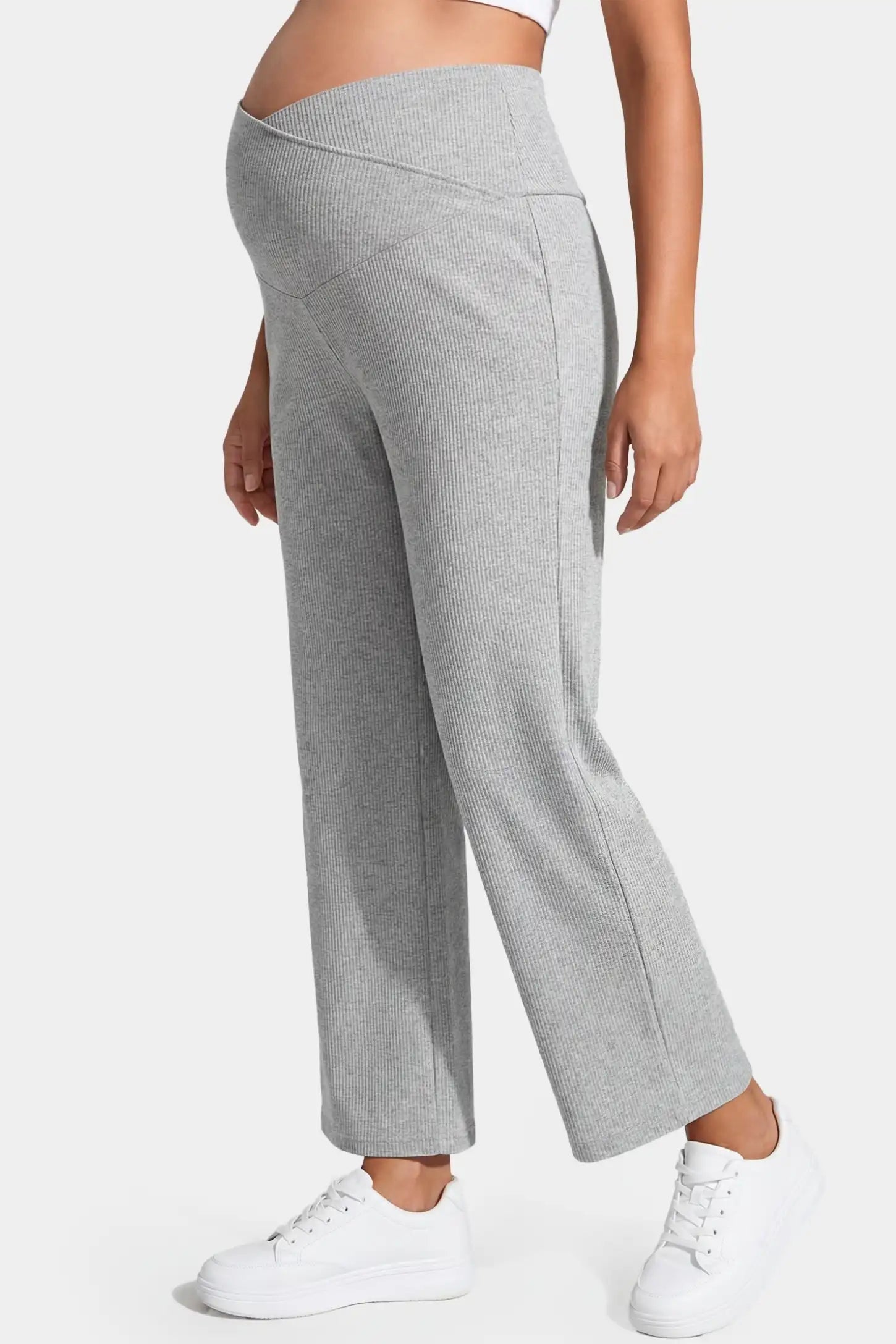 Adjustable Waistband High Waisted Wide-Leg Maternity Pants Adjustable waistband high waisted wide-leg maternity pants in gray featuring stretchy polyester-spandex fabric in side view on a pregnant model