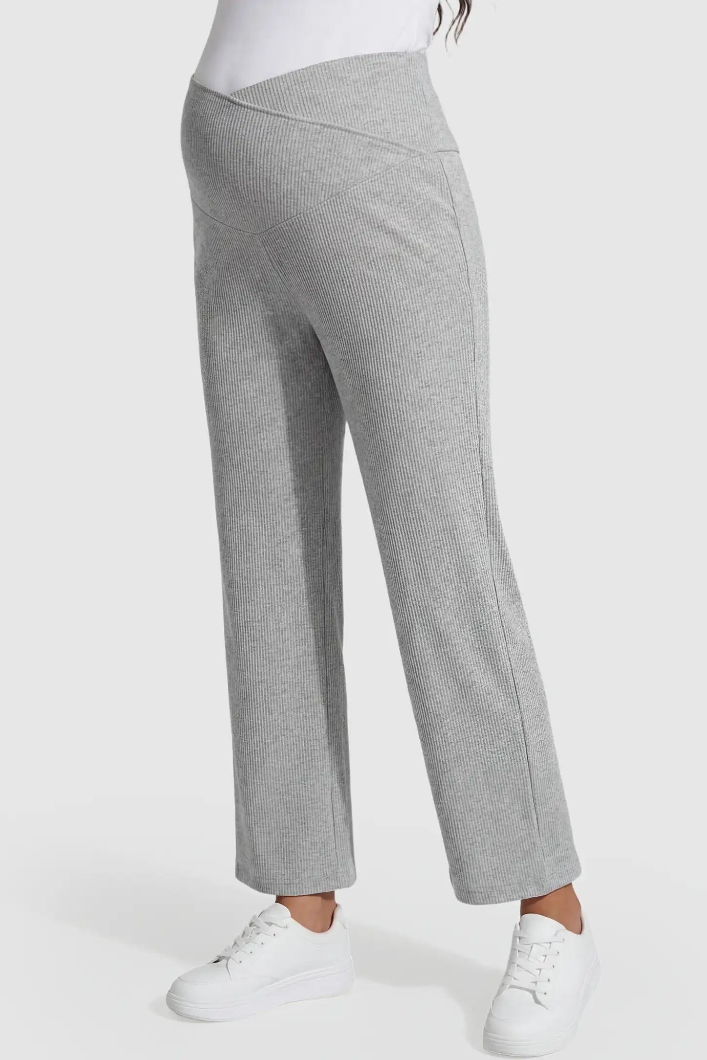 Adjustable Waistband High Waisted Wide-Leg Maternity Pants Adjustable waistband high waisted wide-leg maternity pants in gray featuring stretchy polyester-spandex fabric in side view on a pregnant model