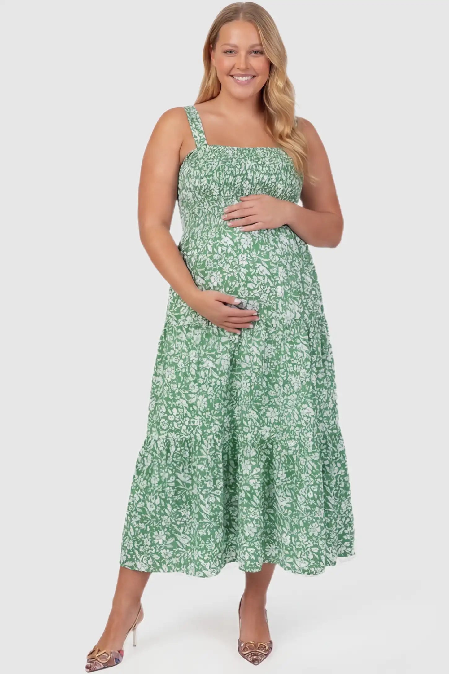 Floral Print Square Neck Tiered Maternity Sundress Floral Print Square Neck Tiered Maternity Sundress in green featuring smocked bodice and wide straps on plus size pregnant model