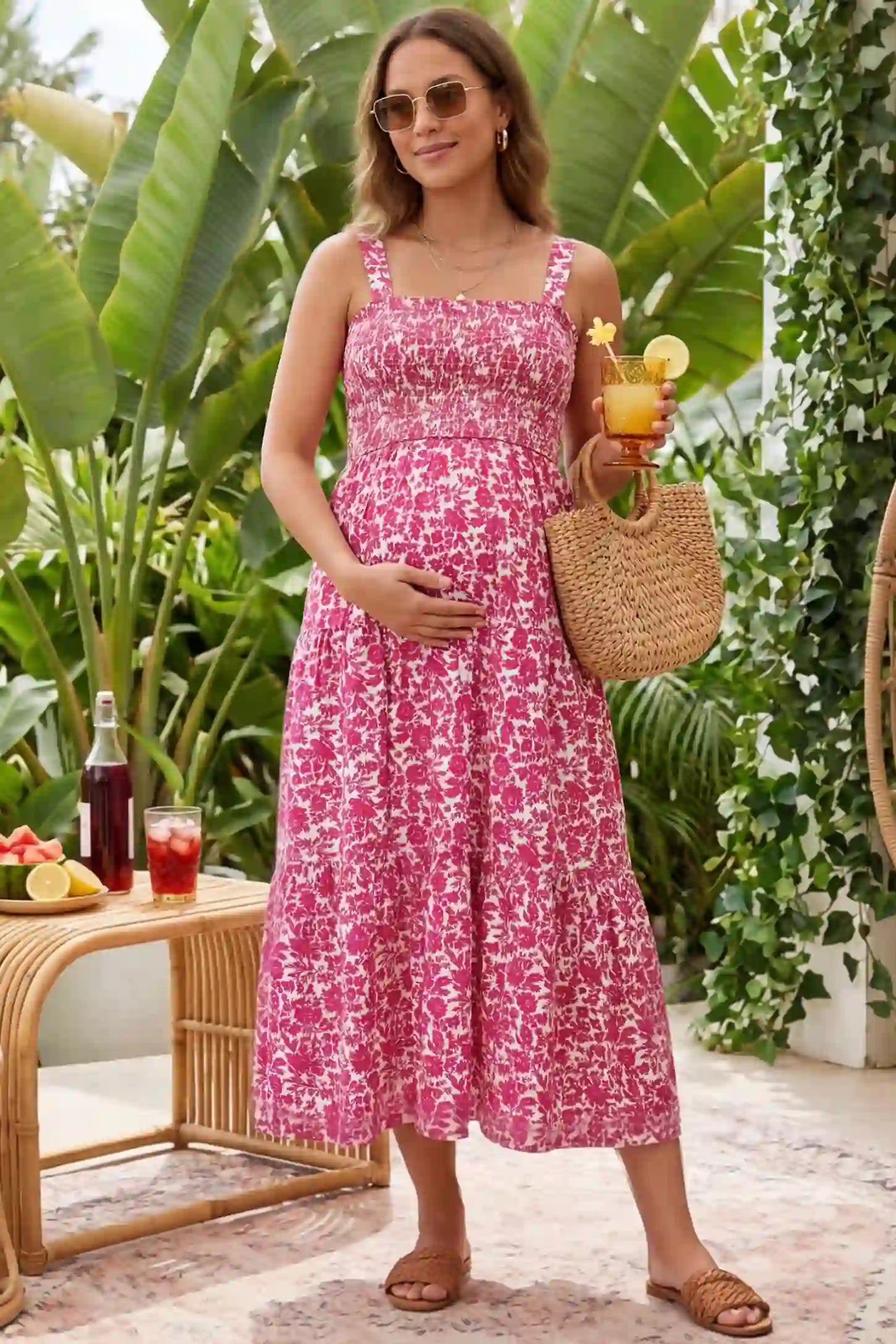 Floral Print Square Neck Tiered Maternity Sundress in rose red featuring smocked bodice and wide straps on pregnant woman front view