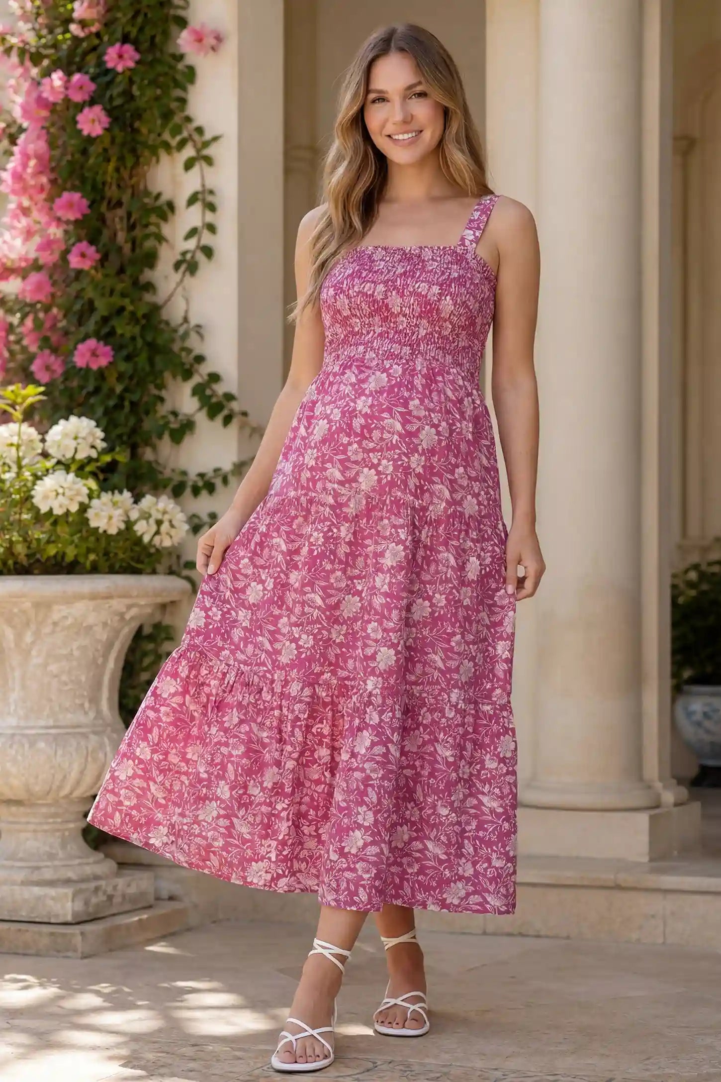 Floral Print Square Neck Tiered Maternity Sundress in rose red featuring smocked bodice and wide straps on pregnant woman front view