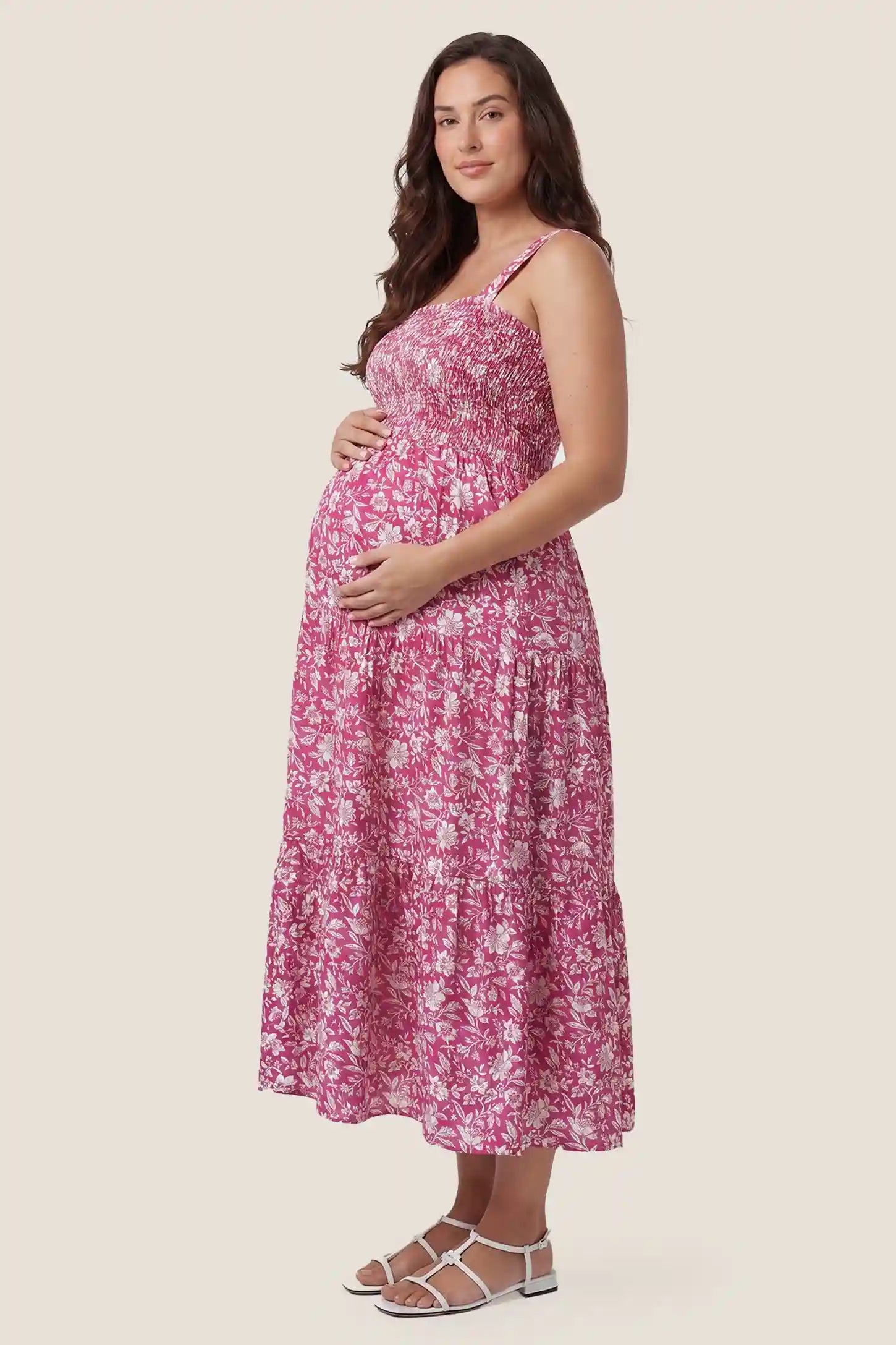 Floral Print Square Neck Tiered Maternity Sundress Floral Print Square Neck Tiered Maternity Sundress in rose red featuring smocked bodice and wide straps on a plus size postpartum model side view