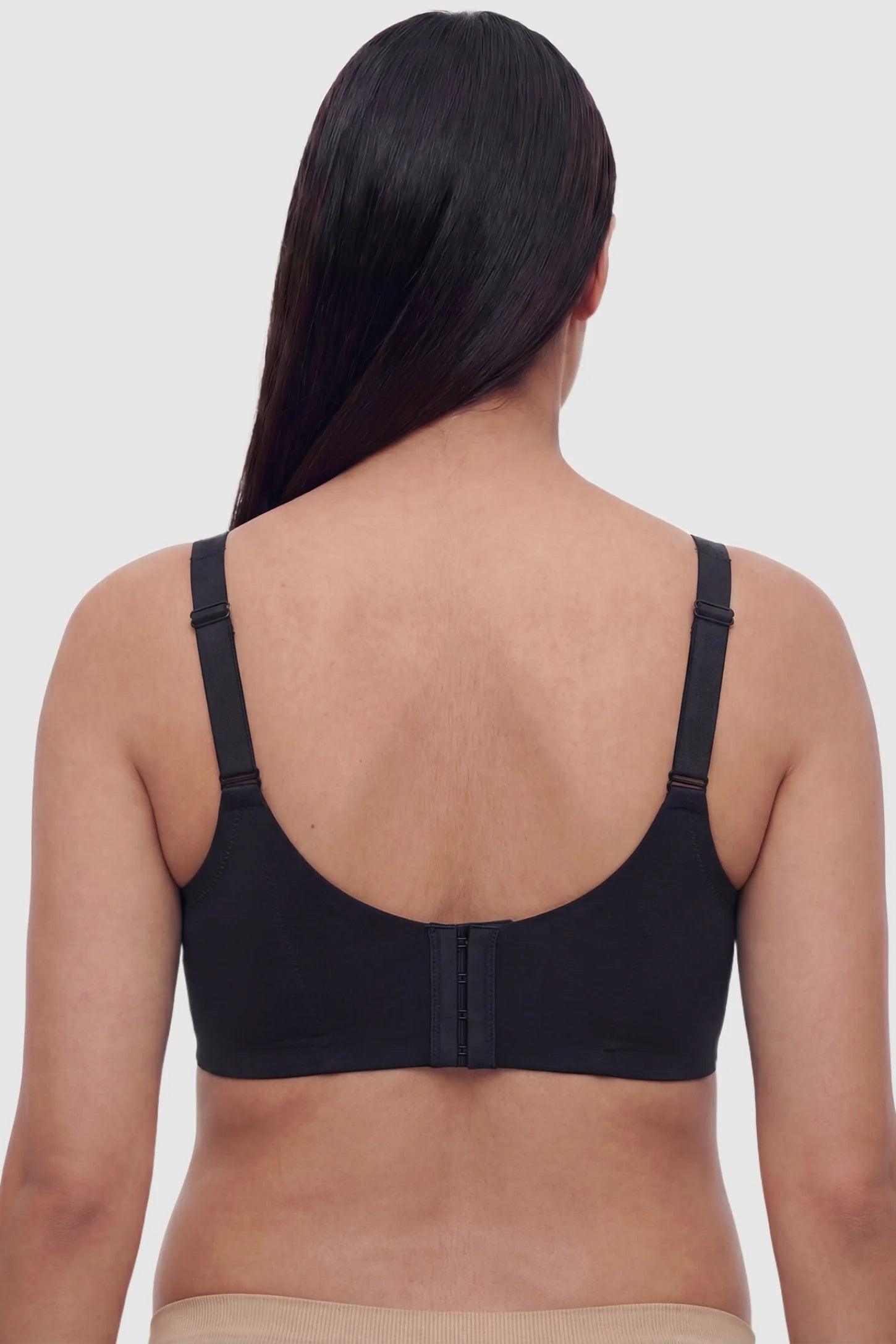Wireless Front-Open Scalloped Lace Maternity Nursing Bra in Black featuring a 3-row hook back view on a back angle view of a model.