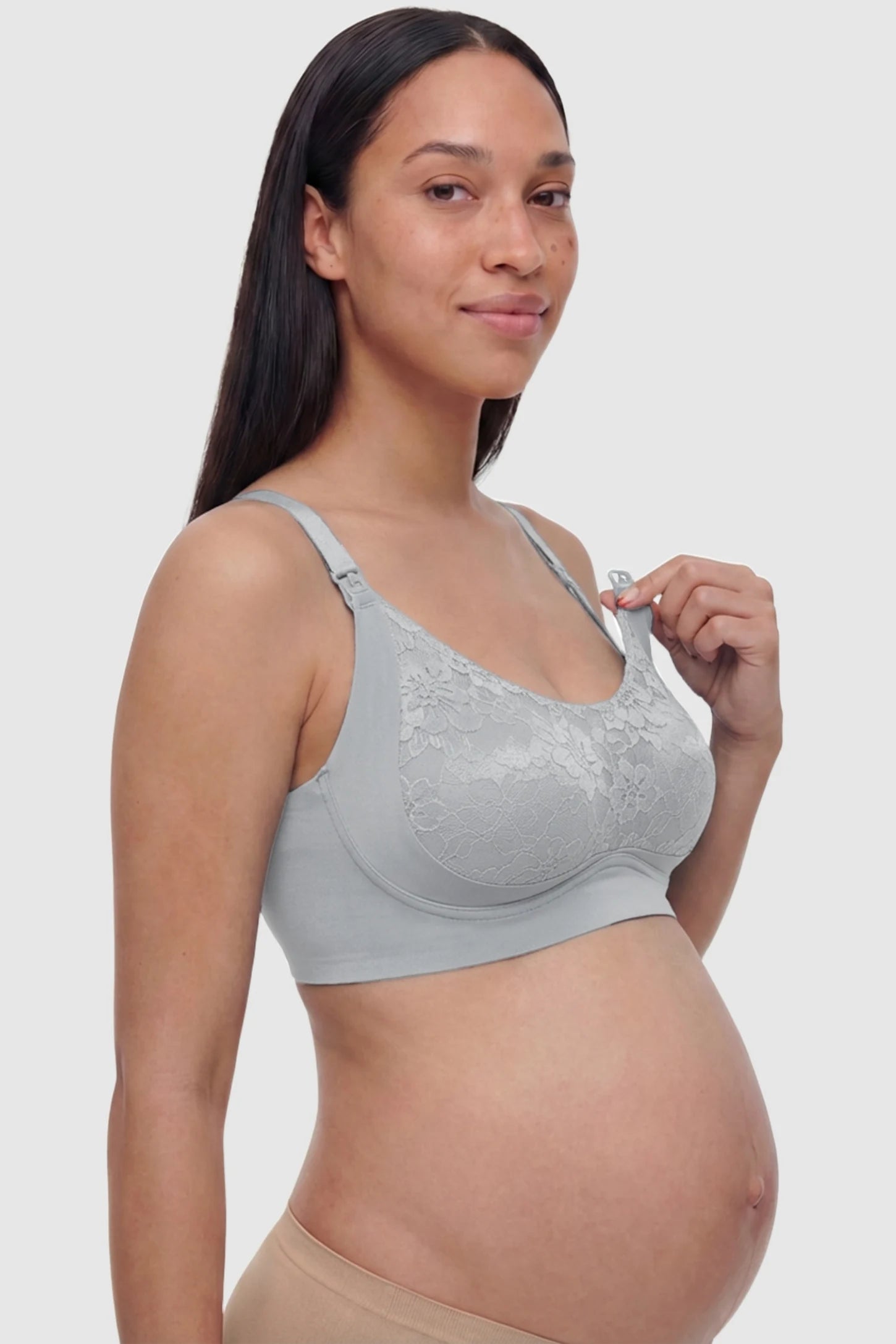 Wireless Front-Open Scalloped Lace Maternity Nursing Bra Wireless Front-Open Scalloped Lace Maternity Nursing Bra in Gray Blue showing easy-access front nursing clips on a side angle view of a pregnant model.