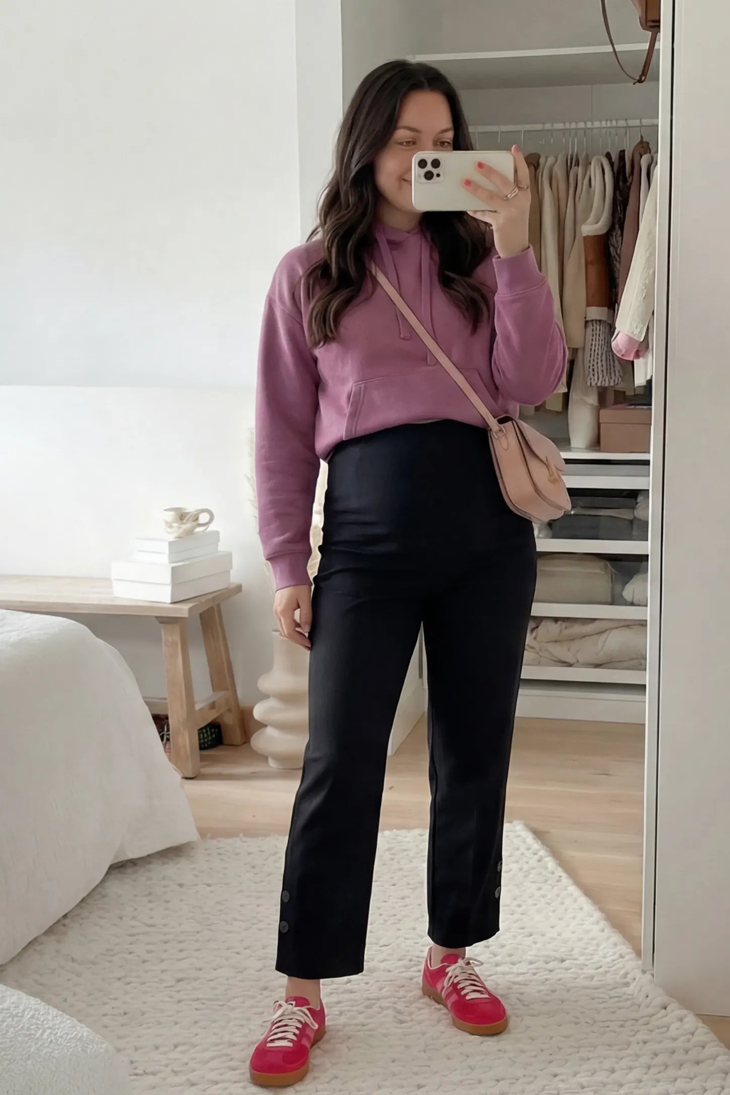 Woolen Blend Adjustable Cropped Wide Leg Maternity Slacks Black Woolen Blend Adjustable Cropped Wide Leg Maternity Slacks styled casually on a pregnant woman in a home setting.
