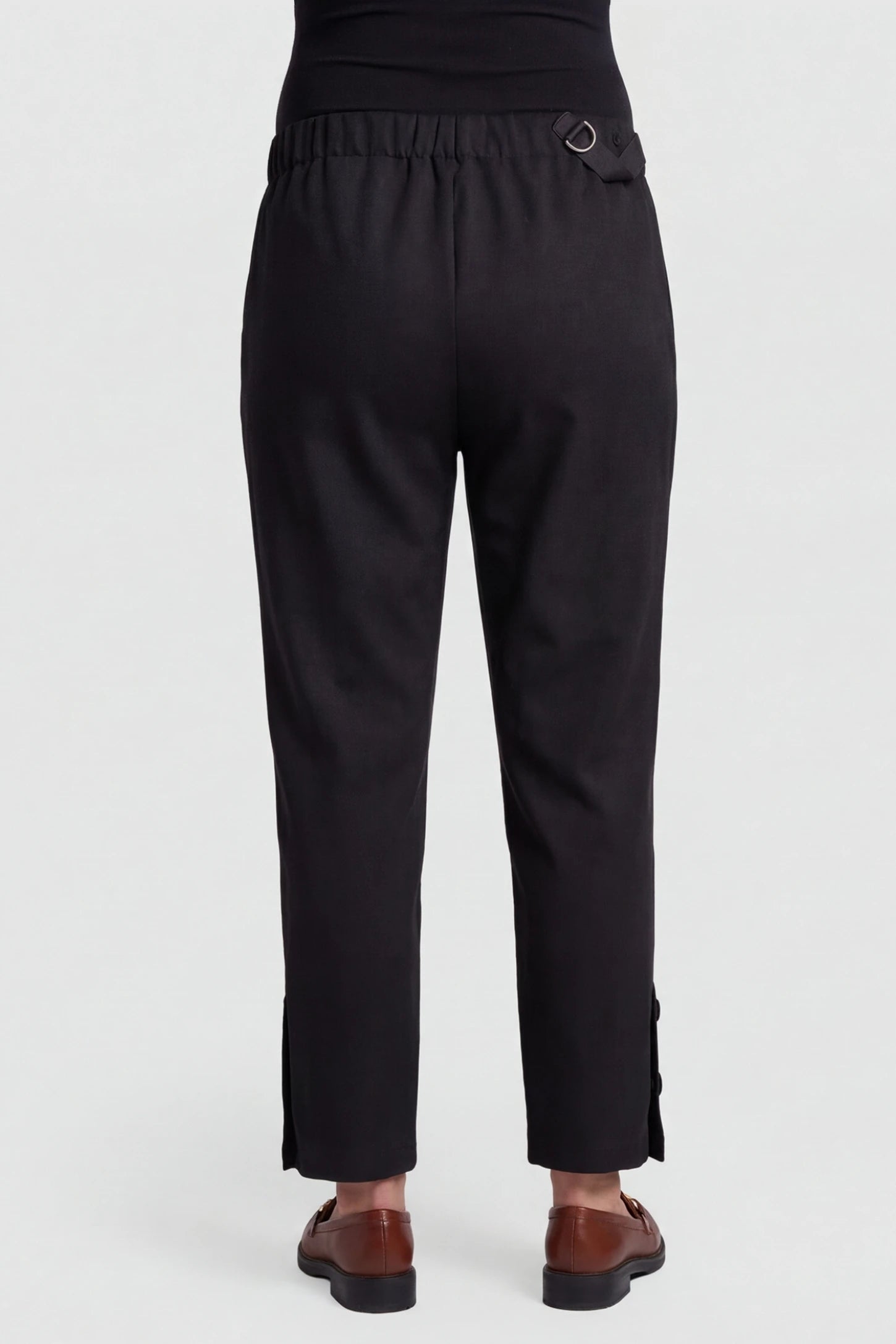 Woolen Blend Adjustable Cropped Wide Leg Maternity Slacks Back view of Black Woolen Blend Adjustable Cropped Wide Leg Maternity Slacks featuring a comfortable elasticized waistband.