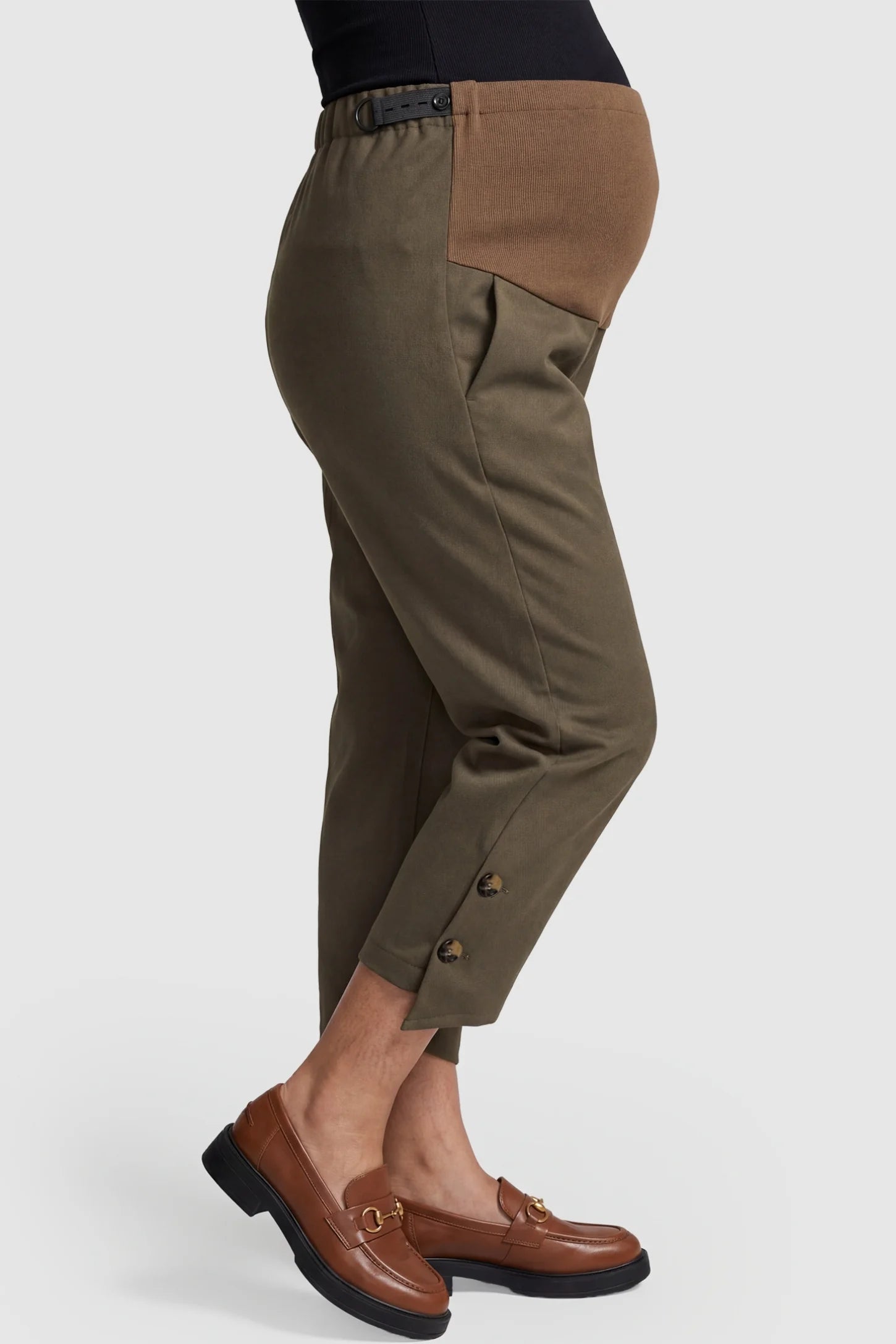 Woolen Blend Adjustable Cropped Wide Leg Maternity Slacks Side view of Coffee Woolen Blend Adjustable Cropped Wide Leg Maternity Slacks showing the adjustable waist tab.