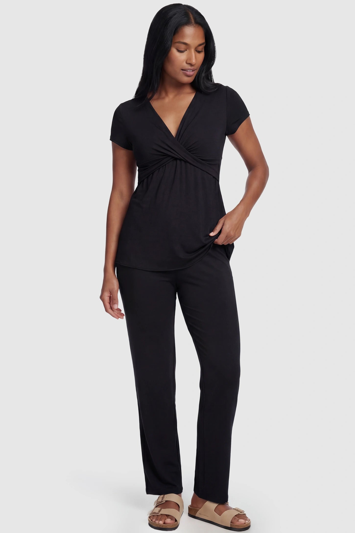 Wrap-Front Wide-Leg Maternity & Nursing Pajama Set Wrap-Front Wide-Leg Maternity & Nursing Pajama Set in black featuring V-neck crossover top and flowy wide-leg pants on non pregnant model.