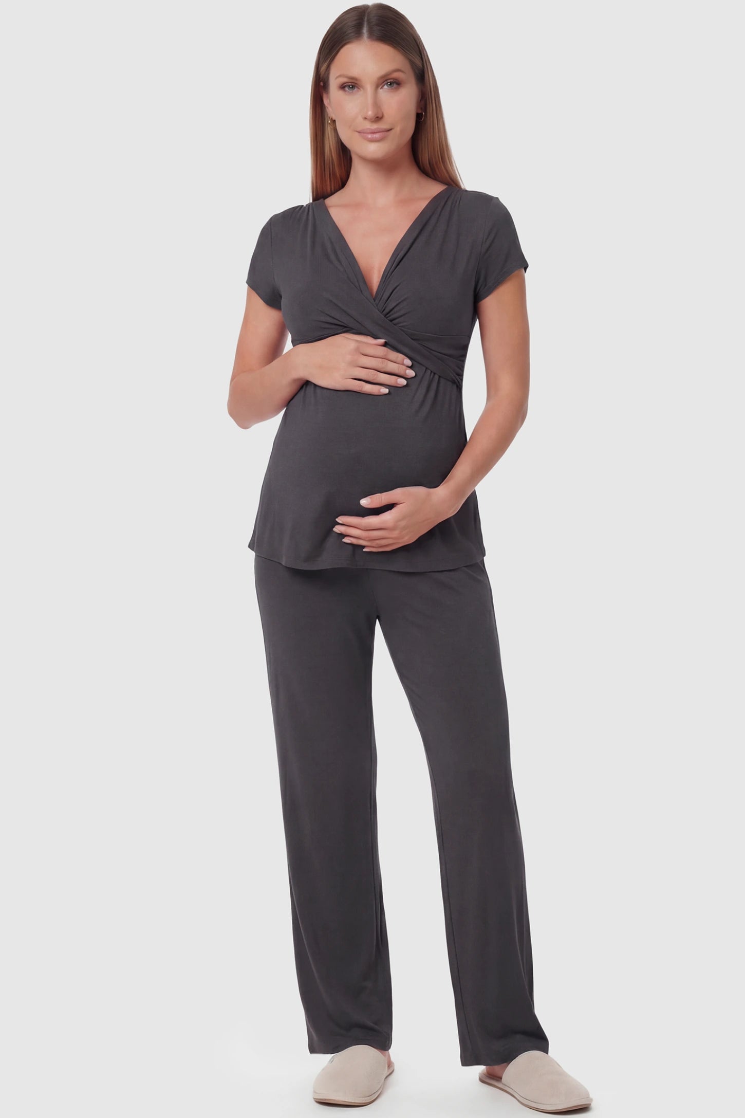 Wrap-Front Wide-Leg Maternity & Nursing Pajama Set Wrap-Front Wide-Leg Maternity & Nursing Pajama Set in dark gray featuring V-neck crossover top and flowy wide-leg pants on pregnant model.