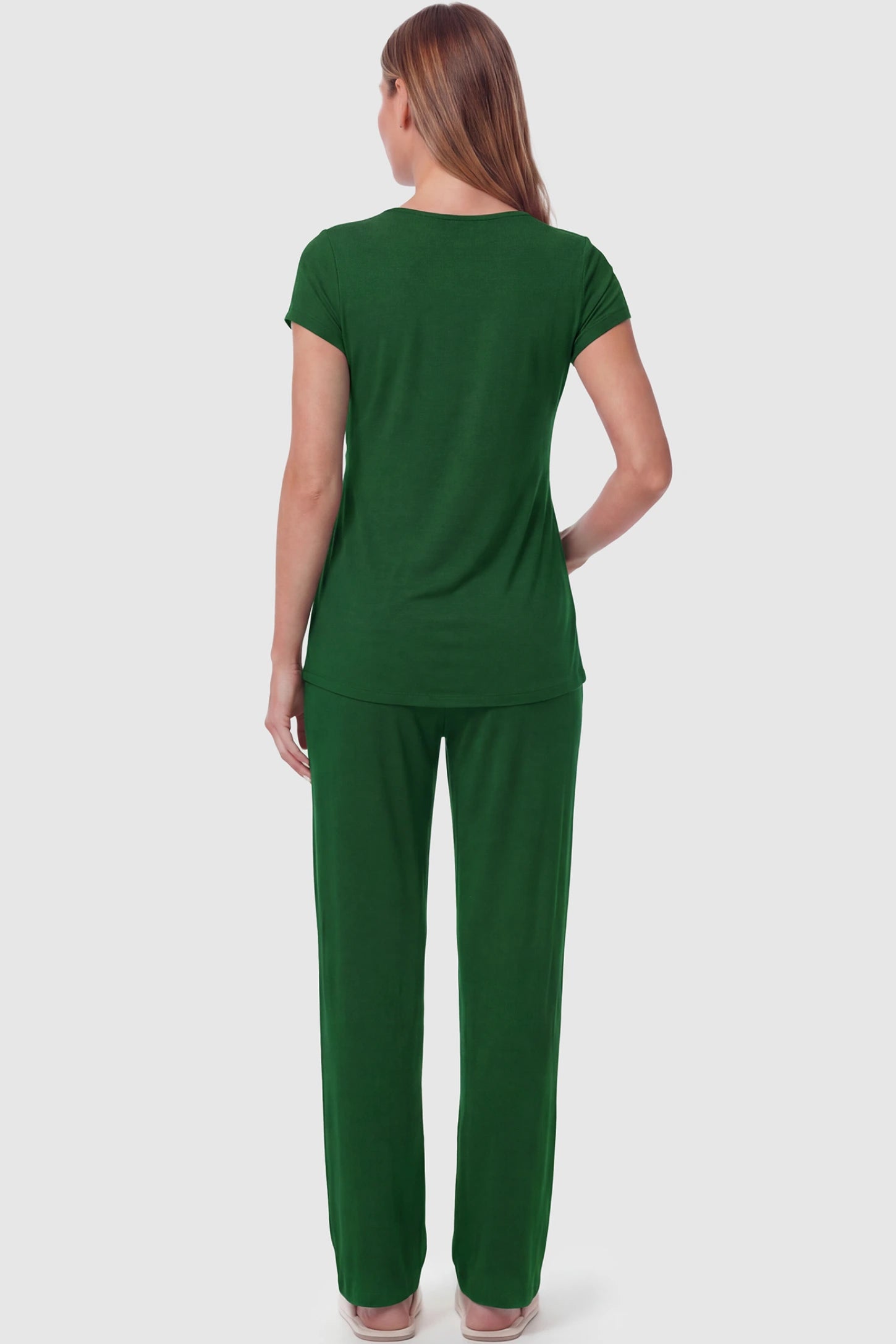 Wrap-Front Wide-Leg Maternity & Nursing Pajama Set Wrap-Front Wide-Leg Maternity & Nursing Pajama Set in green featuring flowy wide-leg pants on pregnant model.