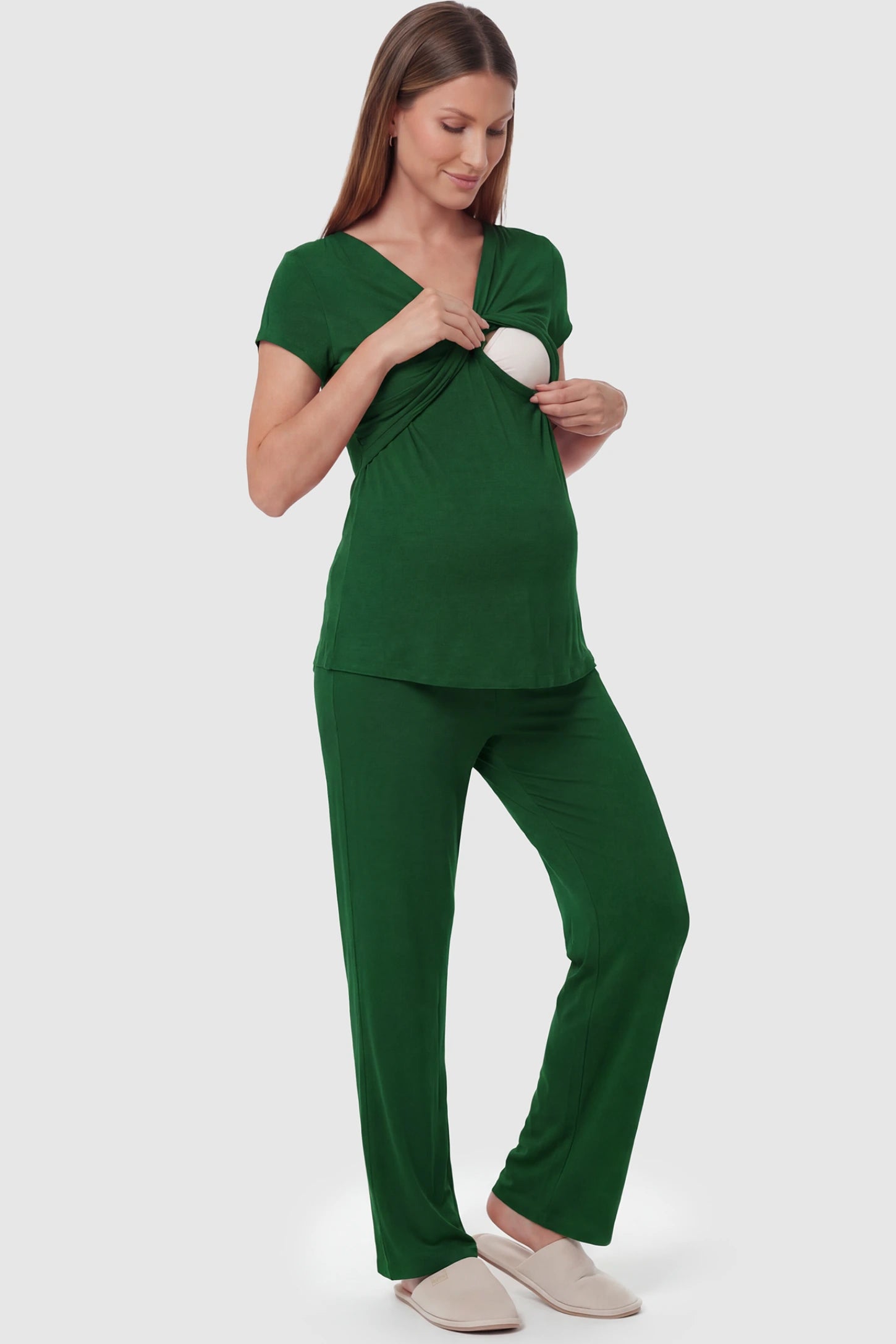 Wrap-Front Wide-Leg Maternity & Nursing Pajama Set Wrap-Front Wide-Leg Maternity & Nursing Pajama Set in green featuring Vnursing access and flowy wide-leg pants on pregnant model.