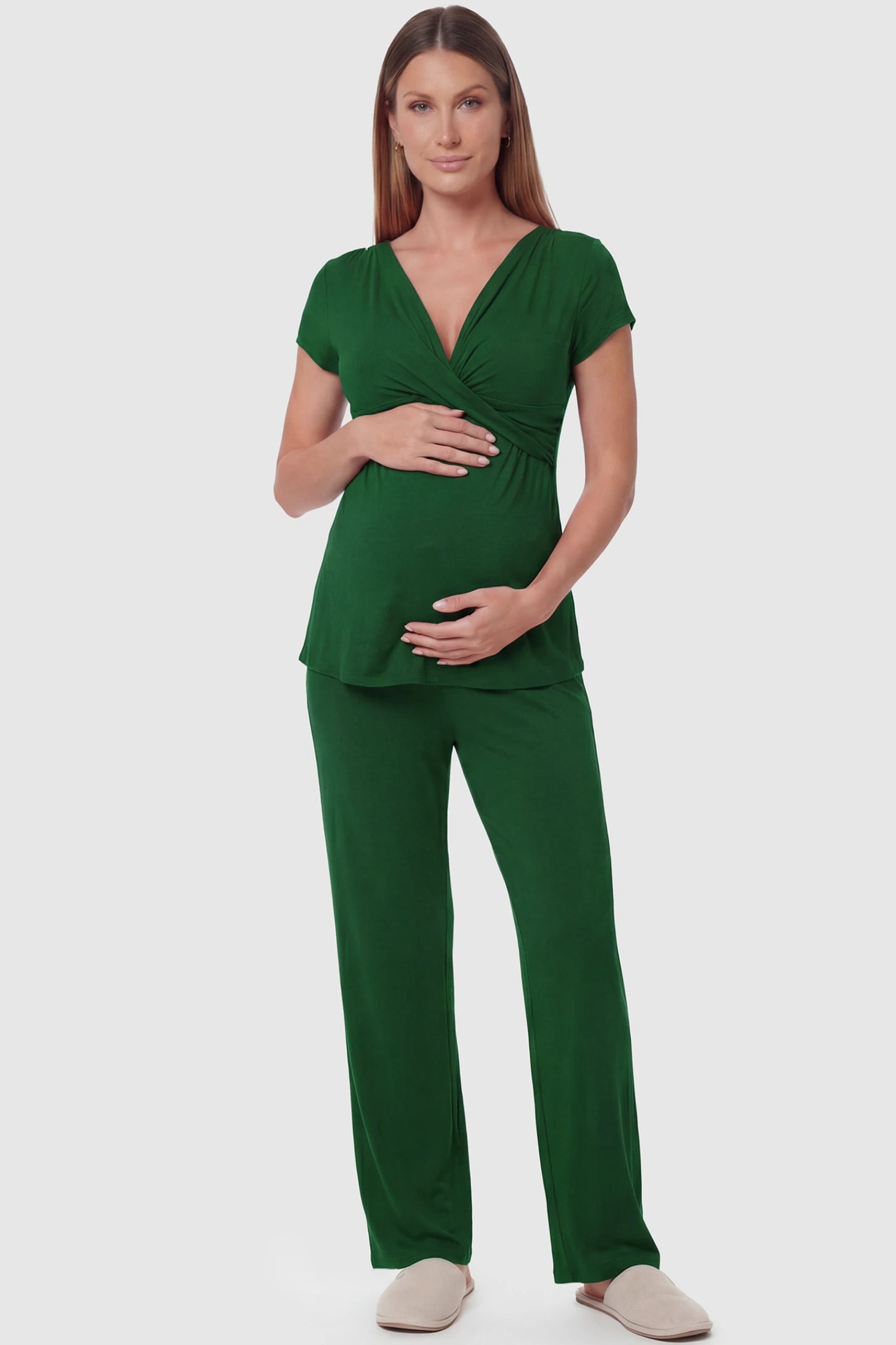 Wrap-Front Wide-Leg Maternity & Nursing Pajama Set Wrap-Front Wide-Leg Maternity & Nursing Pajama Set in green featuring V-neck crossover top and flowy wide-leg pants on pregnant model.