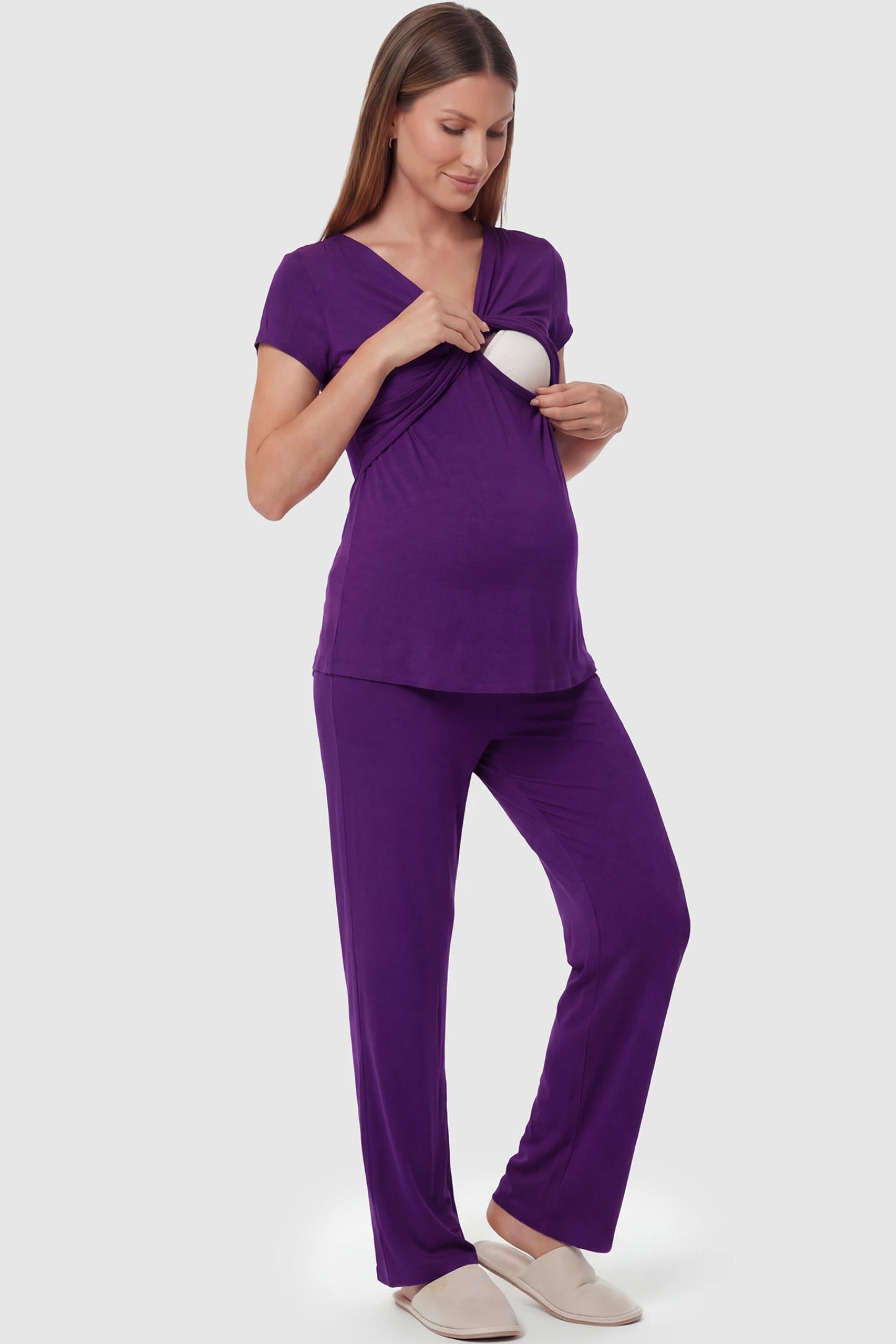 Wrap-Front Wide-Leg Maternity & Nursing Pajama Set Wrap-Front Wide-Leg Maternity & Nursing Pajama Set in purple featuring nursing access and flowy wide-leg pants on pregnant model.