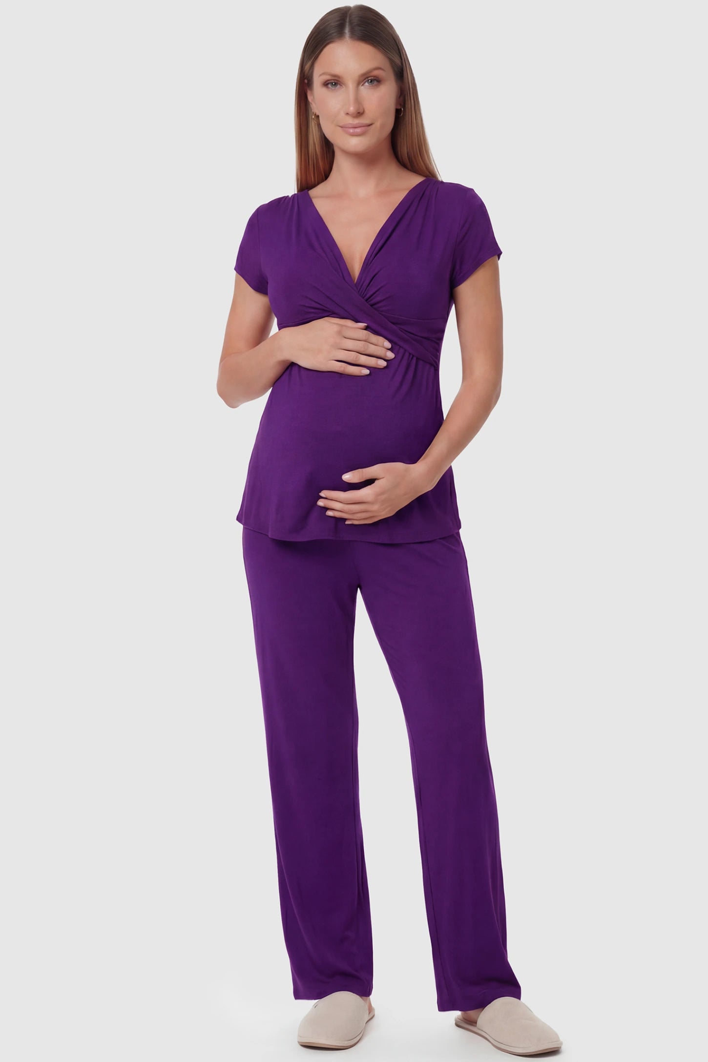 Wrap-Front Wide-Leg Maternity & Nursing Pajama Set Wrap-Front Wide-Leg Maternity & Nursing Pajama Set in purple featuring V-neck crossover top and flowy wide-leg pants on pregnant model.