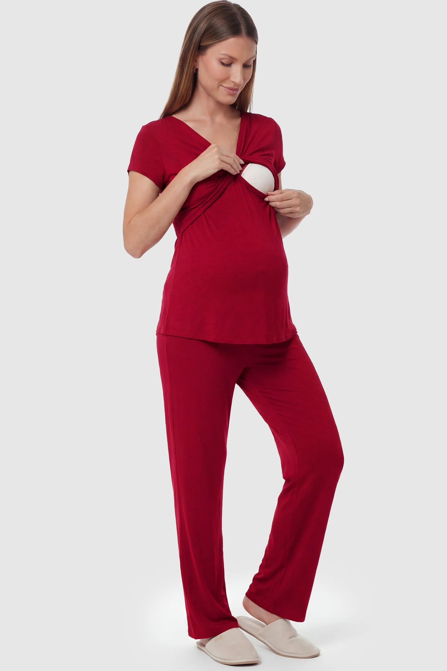 Wrap-Front Wide-Leg Maternity & Nursing Pajama Set Wrap-Front Wide-Leg Maternity & Nursing Pajama Set in red featuringnursing access and flowy wide-leg pants on pregnant model.