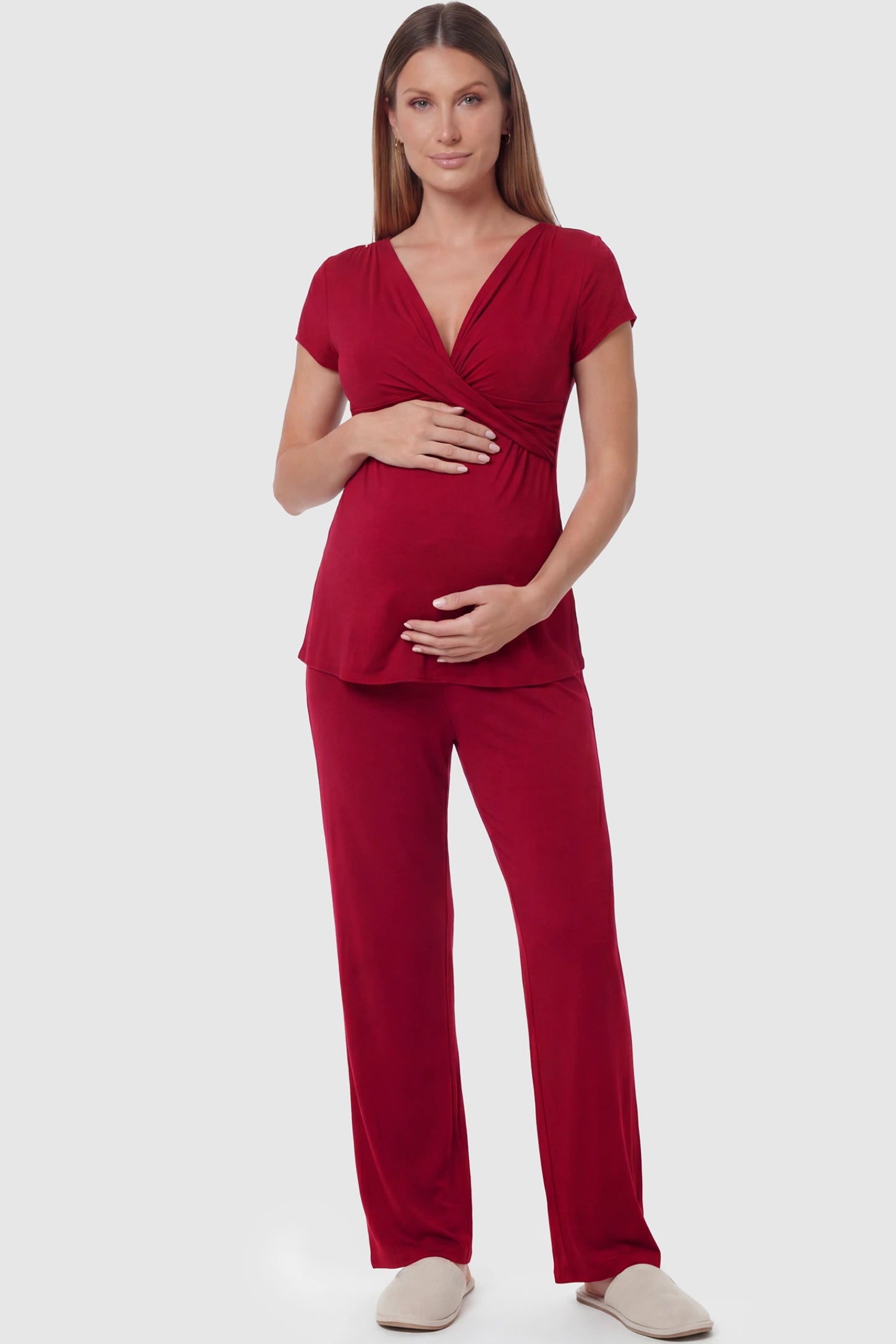 Wrap-Front Wide-Leg Maternity & Nursing Pajama Set Wrap-Front Wide-Leg Maternity & Nursing Pajama Set in red featuring V-neck crossover top and flowy wide-leg pants on pregnant model.
