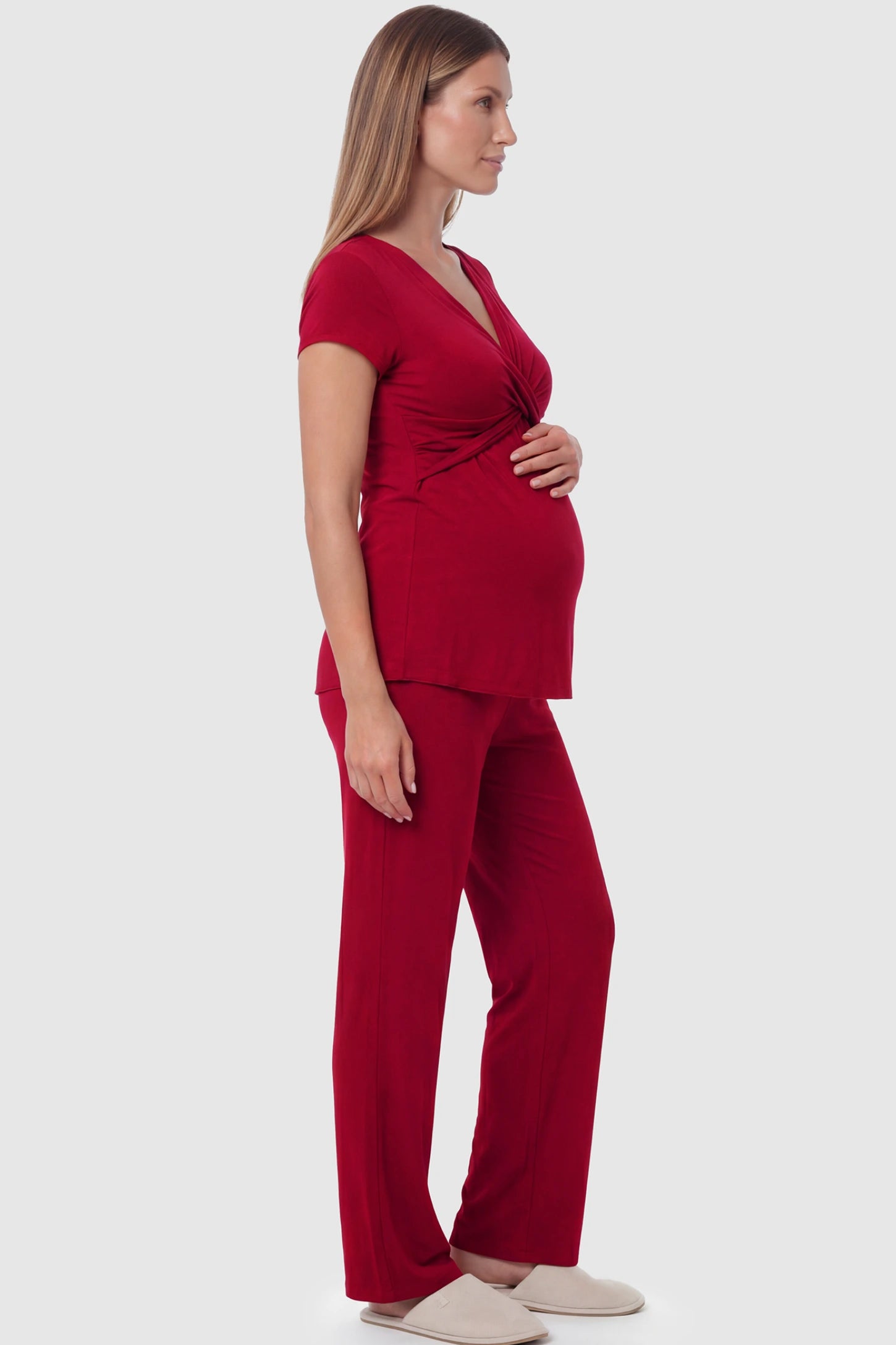 Wrap-Front Wide-Leg Maternity & Nursing Pajama Set Wrap-Front Wide-Leg Maternity & Nursing Pajama Set in red featuring V-neck crossover top and flowy wide-leg pants on pregnant model.