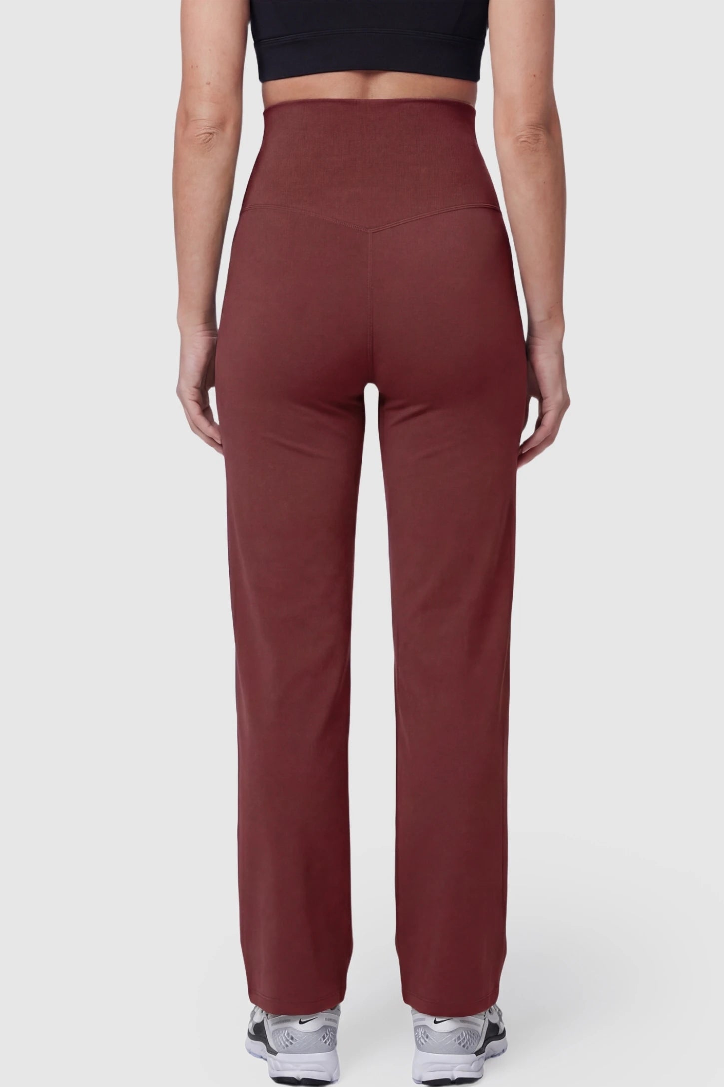 Suede-Finish High-Waisted Straight Leg Yoga Maternity Pants Suede-finish high-waisted straight leg yoga maternity pants in burgundy with straight-leg cut, back view on pregnant model